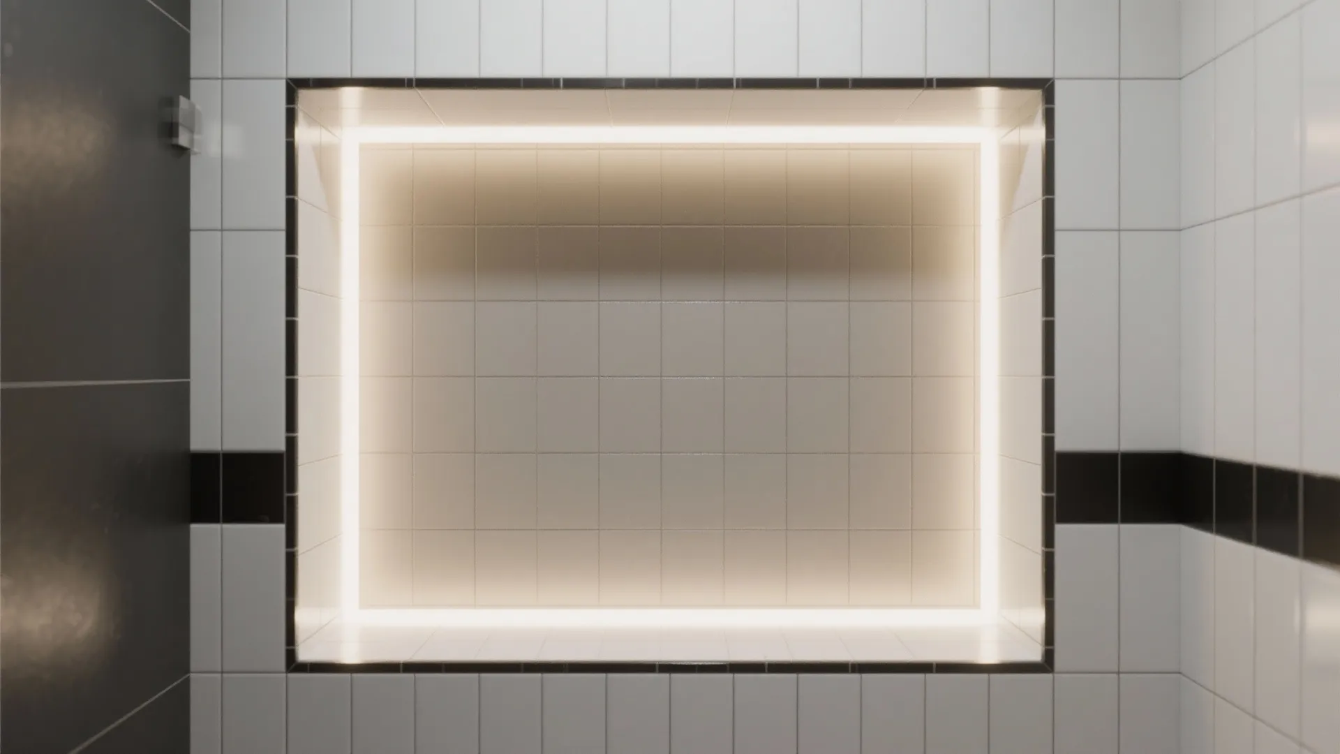 Shower niche with neutral tile and surrounding white tiles with black grout, lit to show depth.