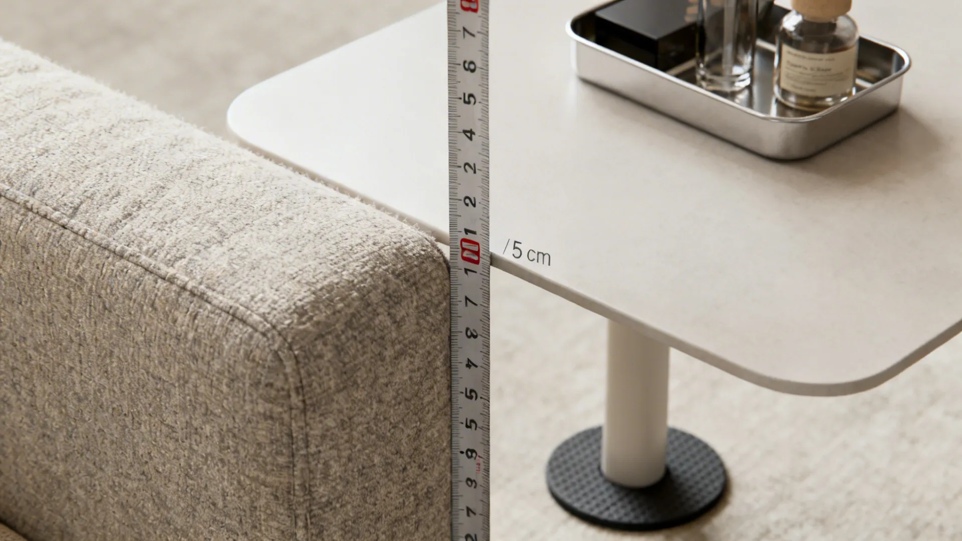 Tape measure showing ideal table height, tray on small table, and non-slip pads under legs.