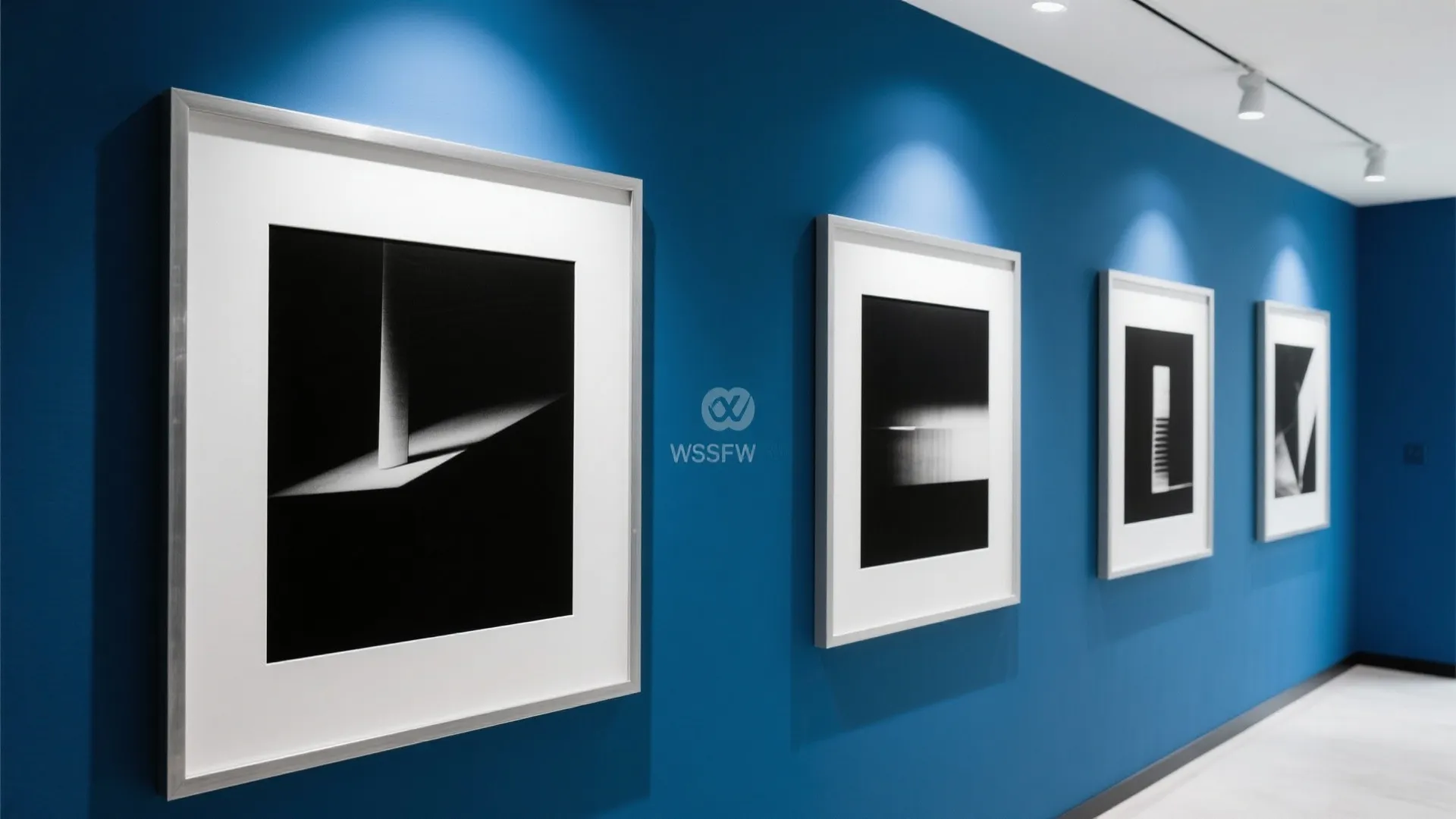 7. Silver-Framed Art Against Blue Walls