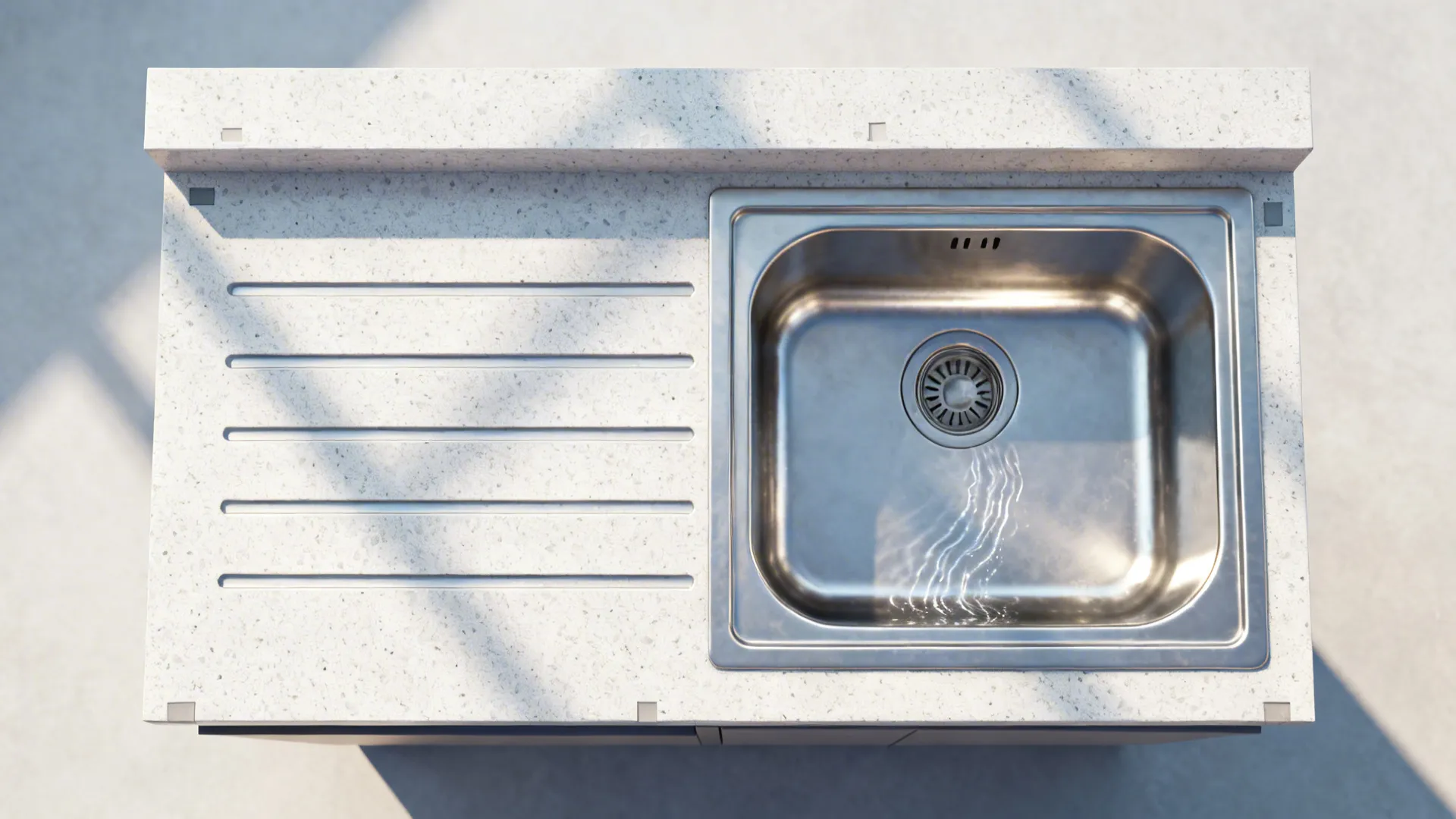 Top-down view mapping an undermount sink with quartz drainer grooves and upstand.
