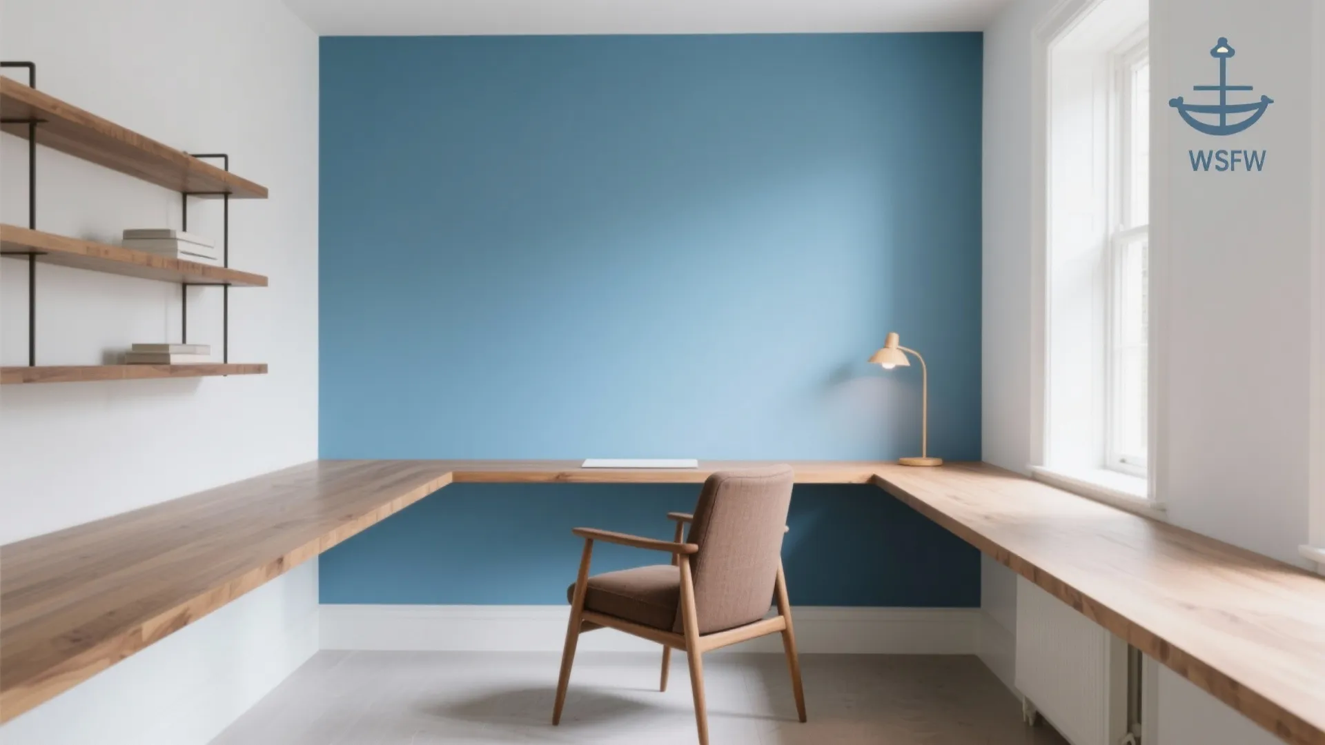 Minimalist home office with blue wall wooden corner desk brown chair and wooden wall shelves