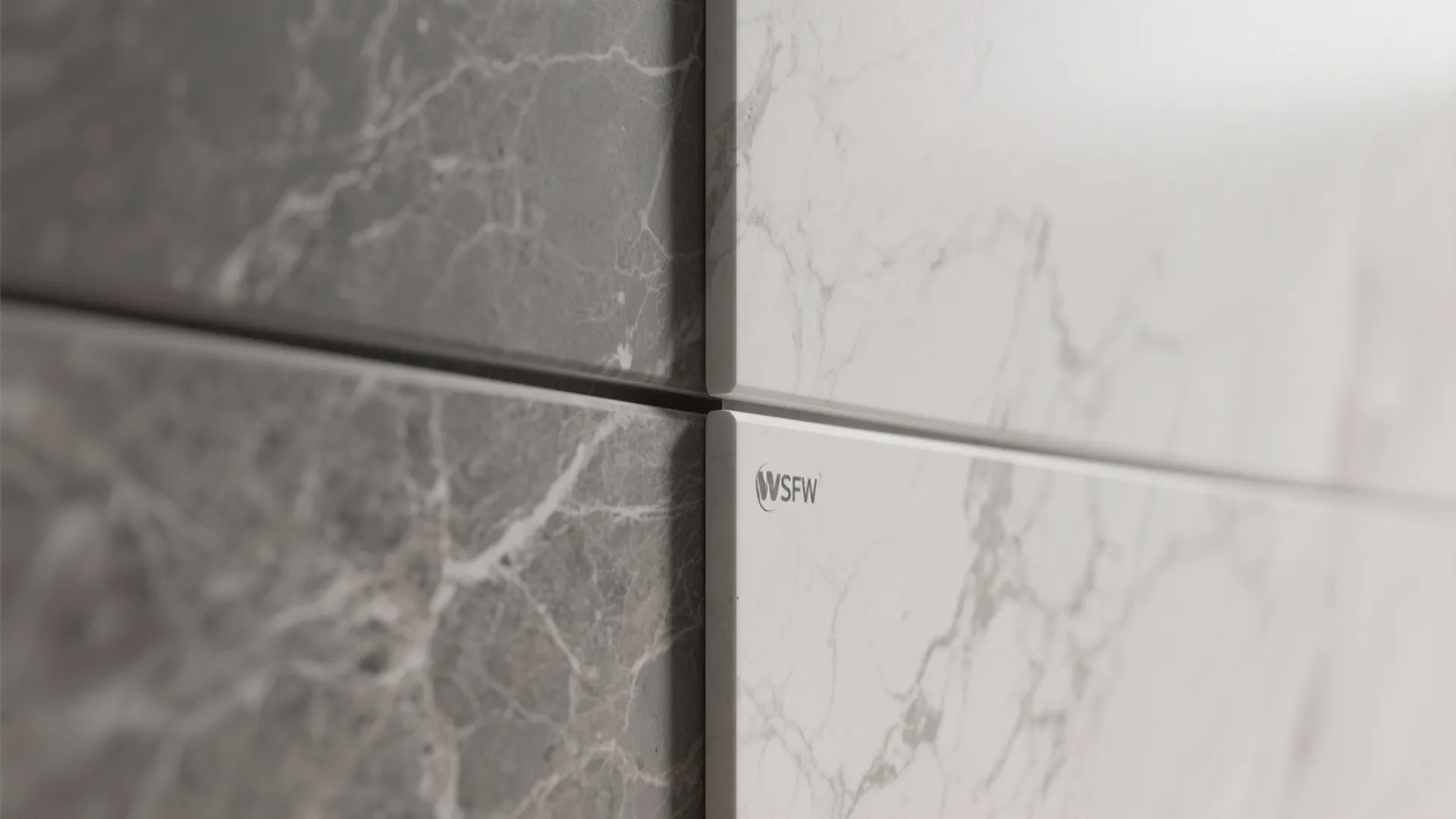 Macro of large-format porcelain slab with rectified edge and thin grout joint.