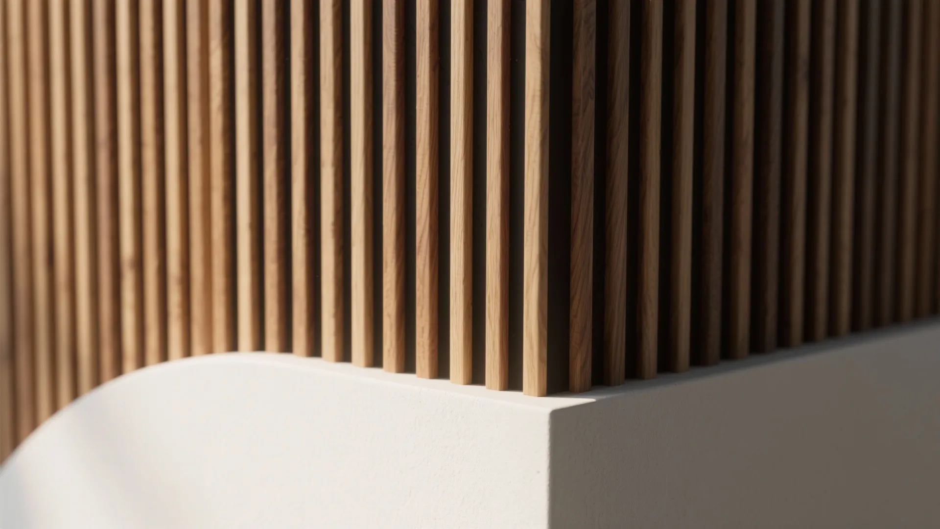 Modern wood wall panel with vertical slats installed on a curved white interior base structure