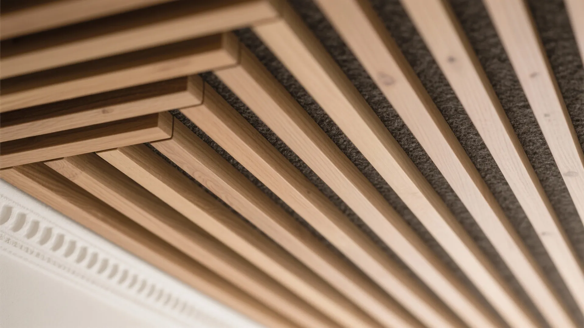 Textured gypsum or slatted ceilings to add character