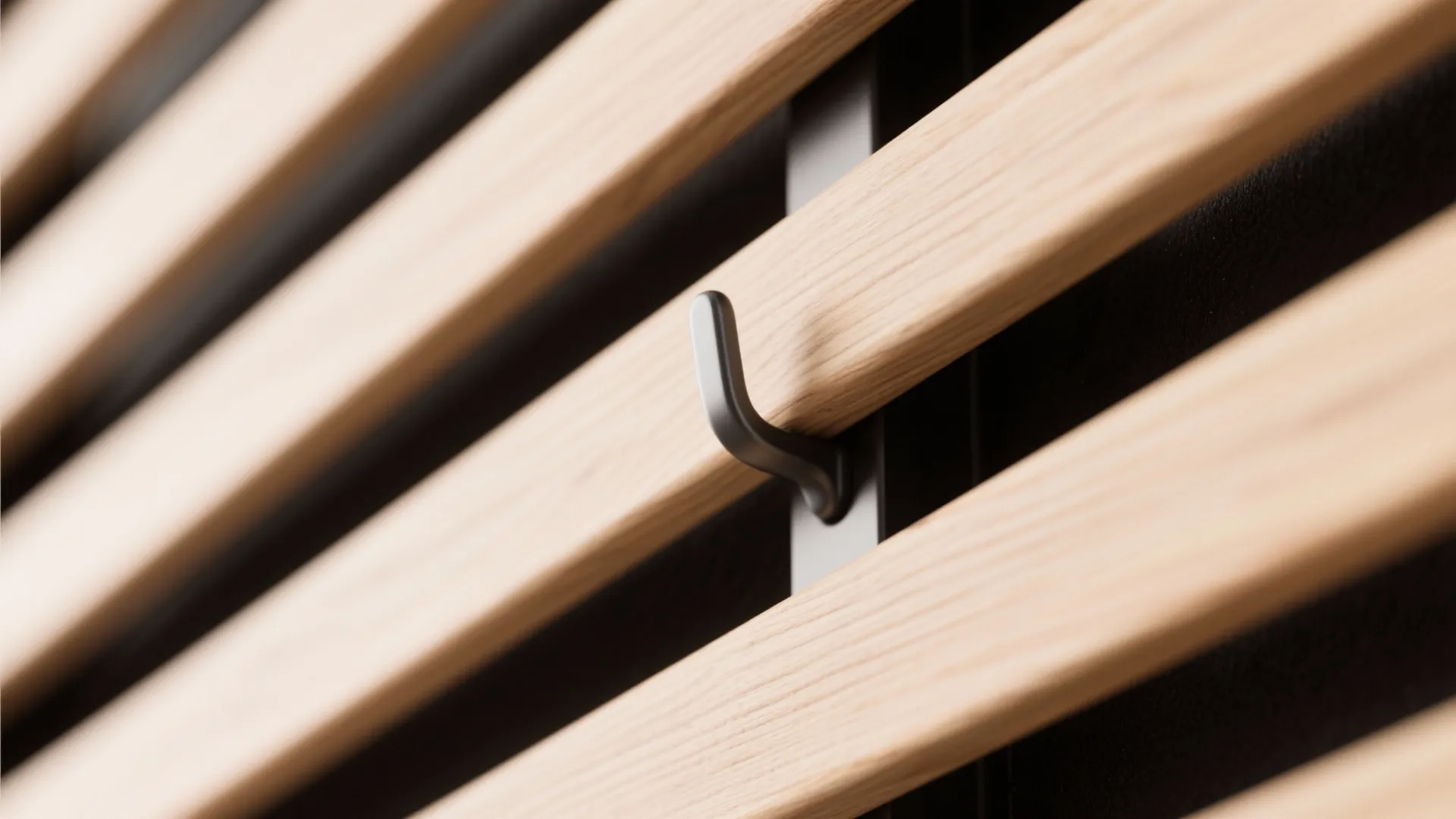 Vertical slat wall with hooks and a slim bench