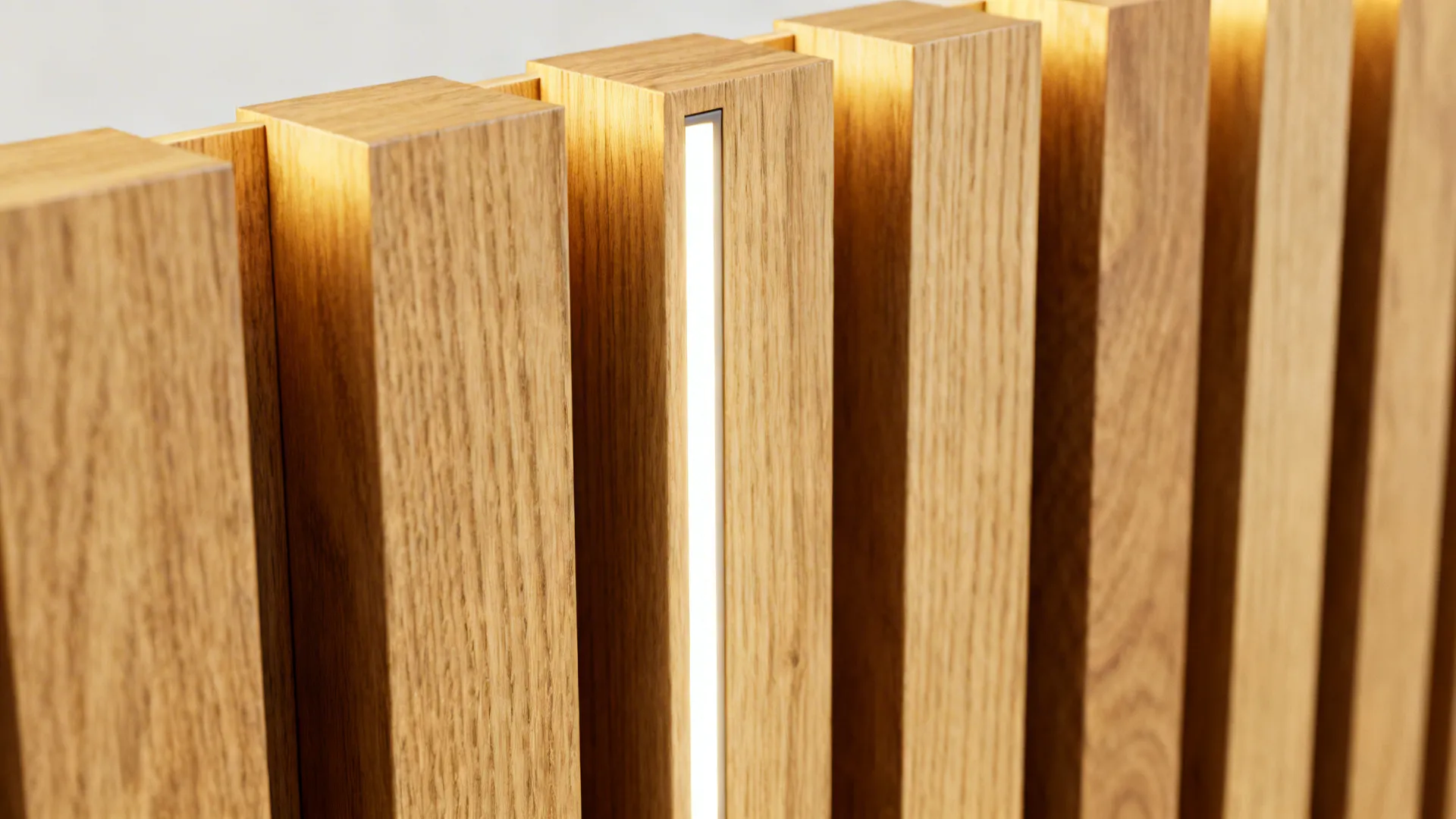 Macro of oak slat divider with matte finish and integrated LED glow detailing texture.