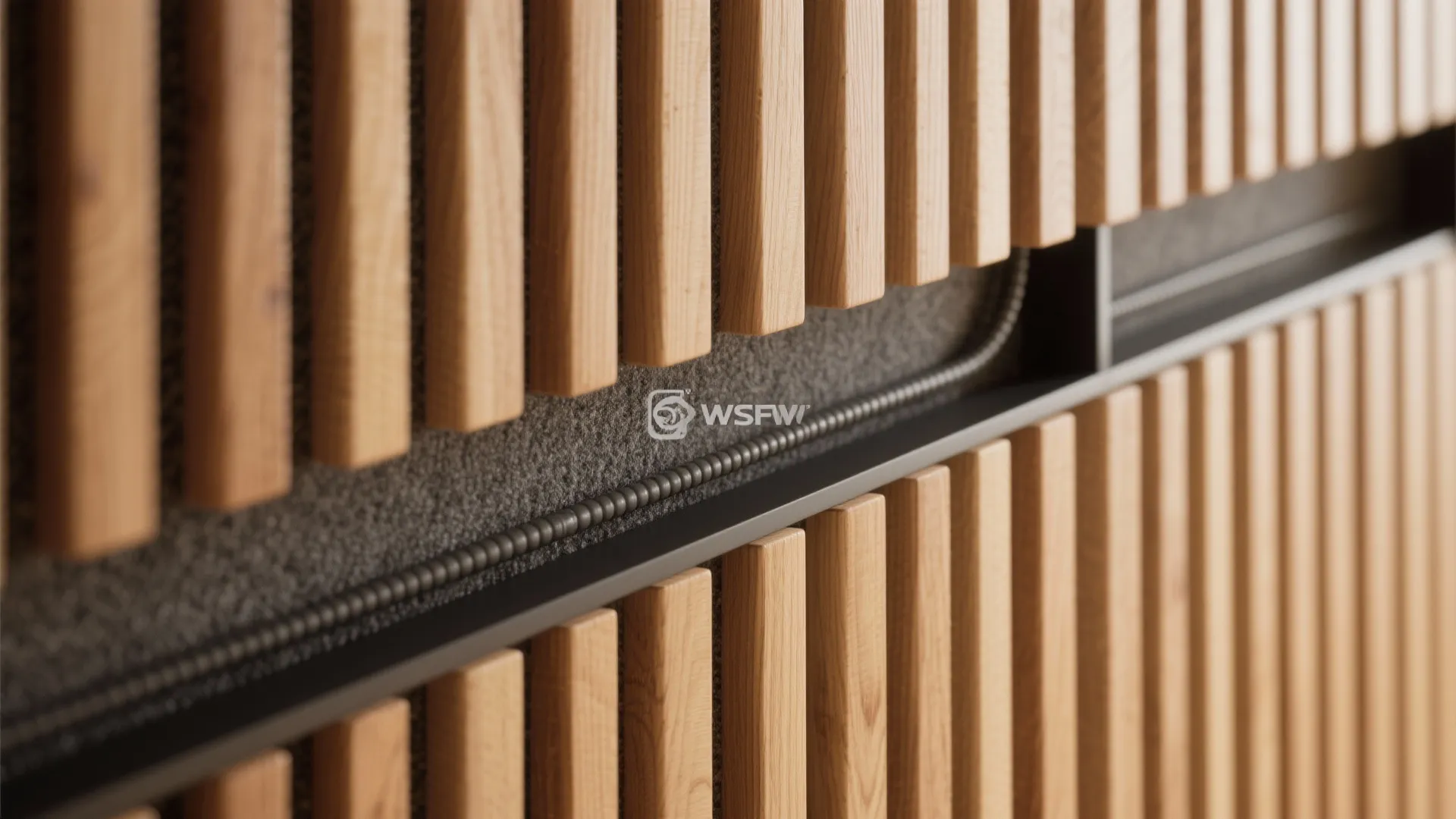 Close up of vertical wooden wall panels showing detailed texture with a dark metal rail