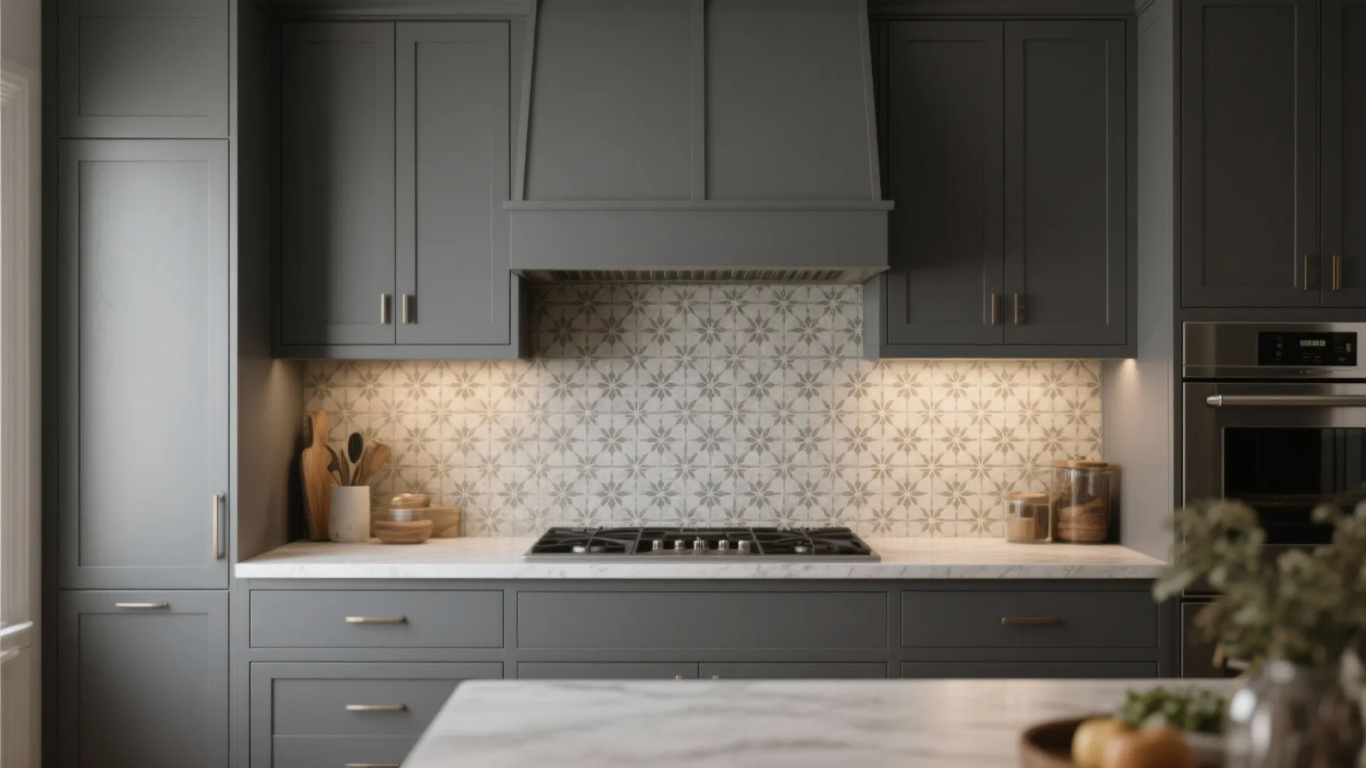 Slate grey cabinets paired with classic encaustic tile backsplash and sealed grout.