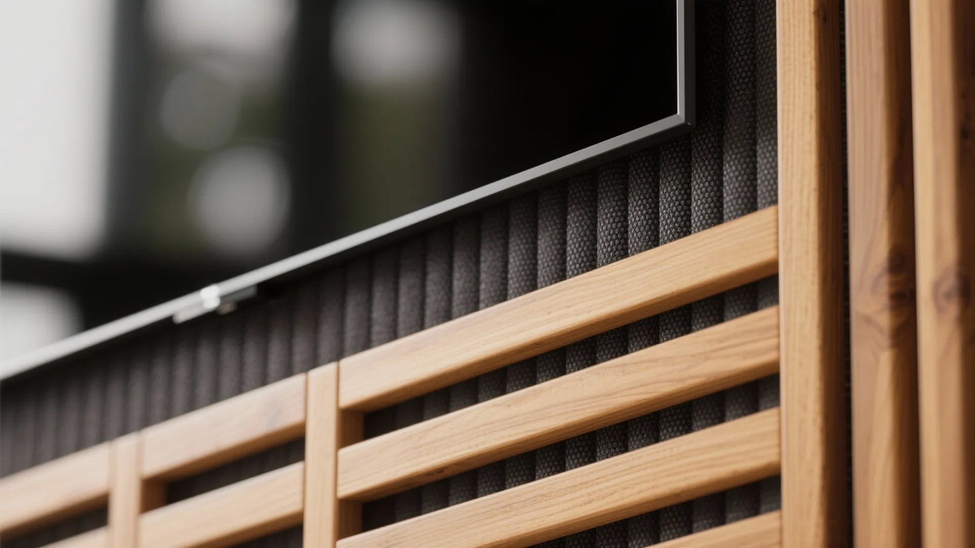 4) Warmth and acoustics: slatted wood with fabric backing