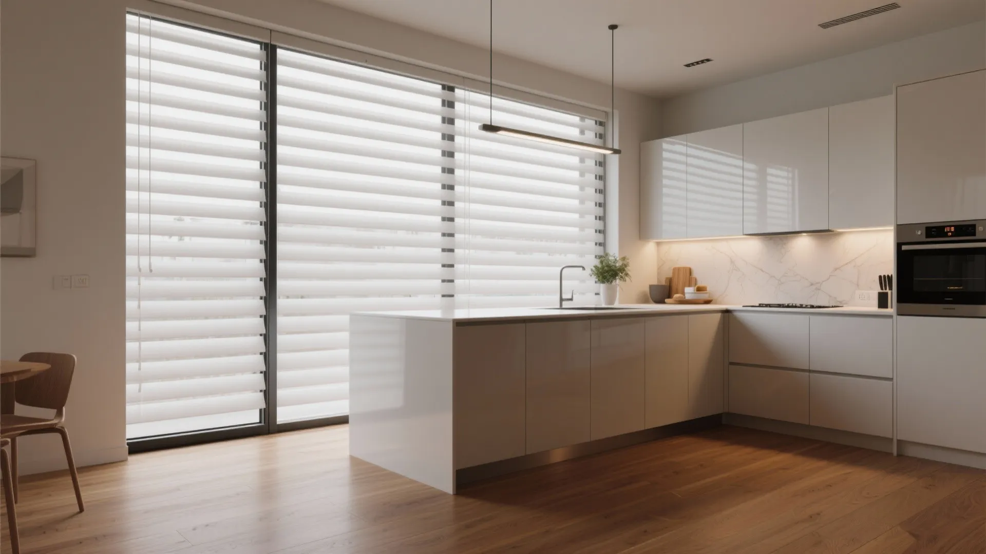 Modern white kitchen with large window blinds wood floor kitchen island and white sleek cabinets