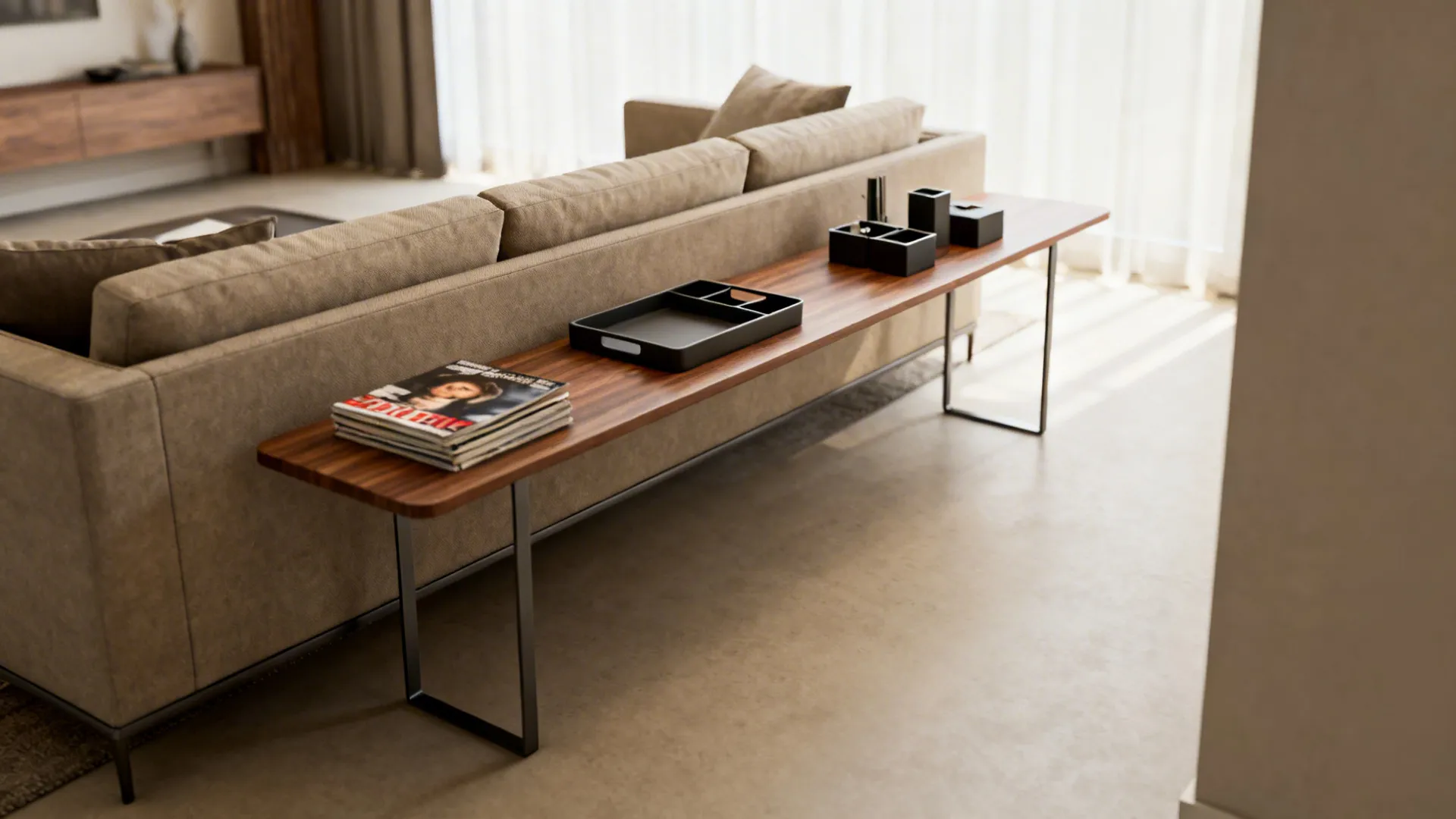 Slim console used as a narrow coffee table behind a sofa with trays and organizers.