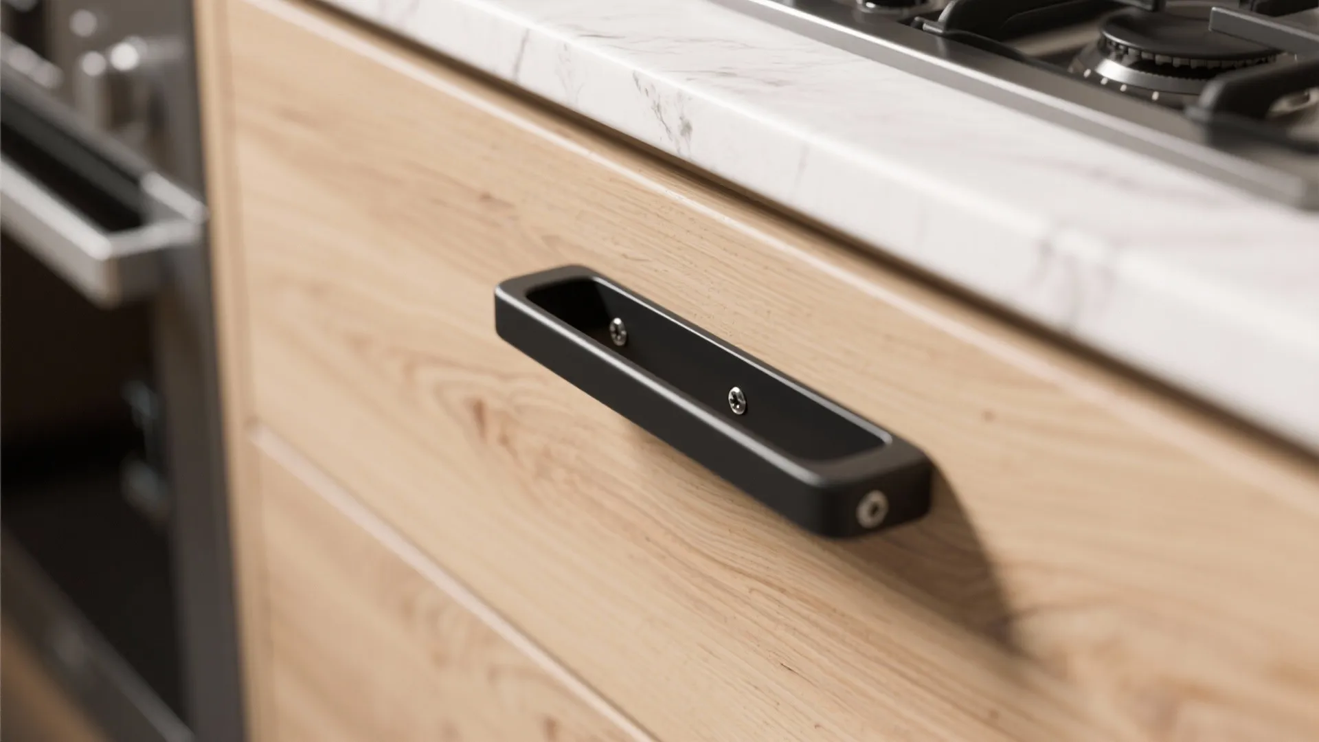 Slim black edge pull on a cabinet edge in a tight galley kitchen showing low profile and clearance.