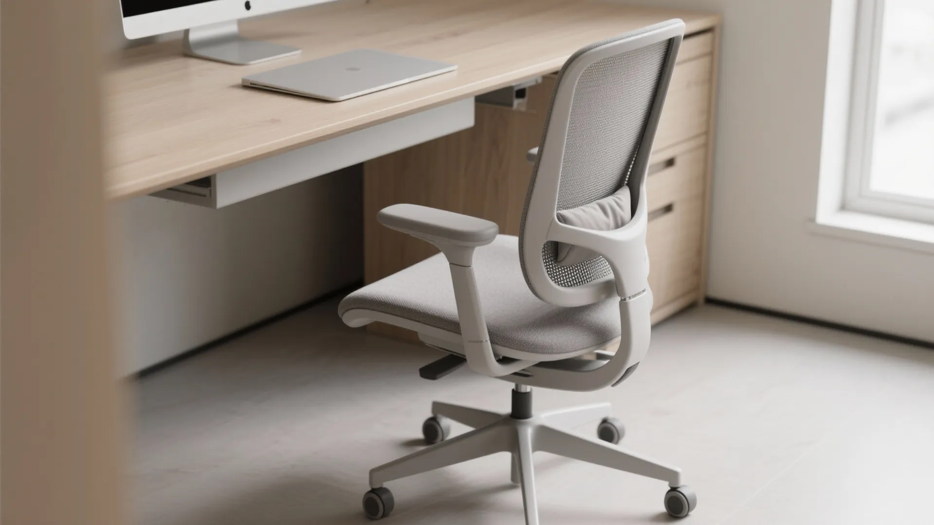 Slim-profile ergonomic chairs