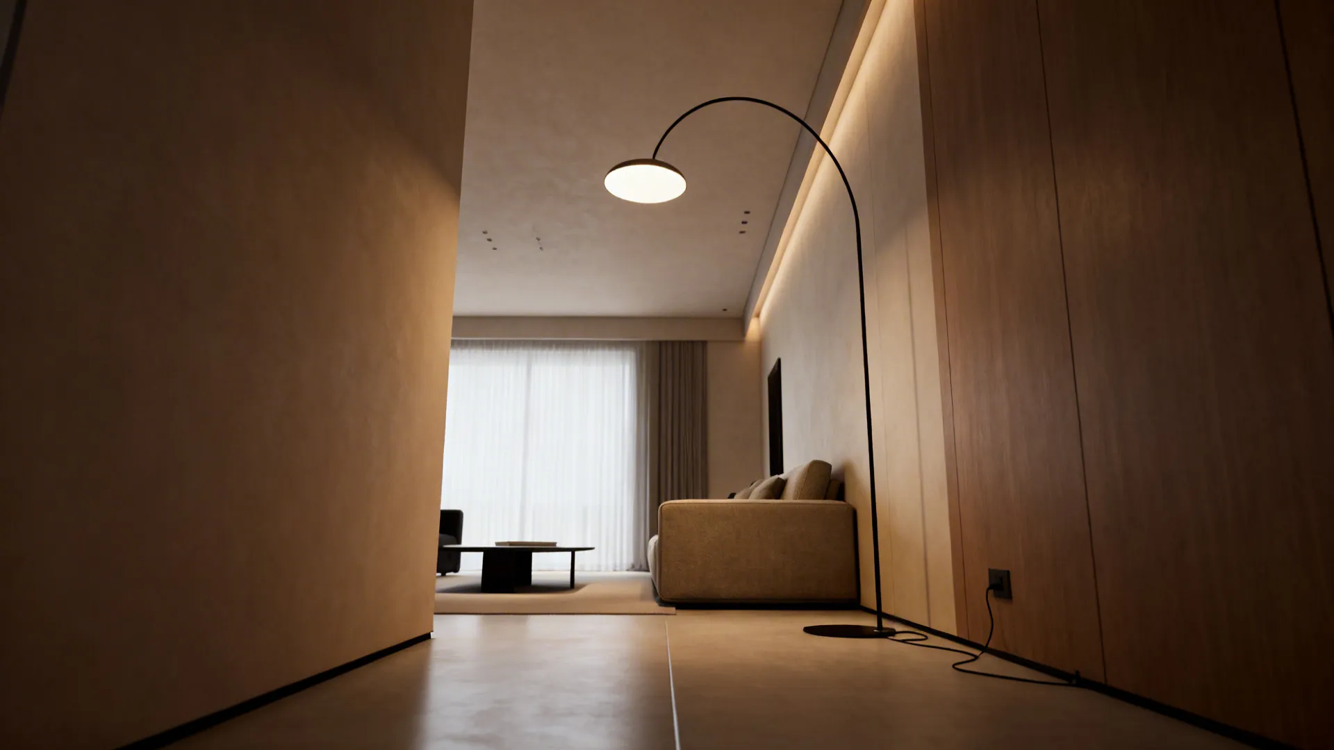 Narrow living room with a slim arched floor lamp emphasizing vertical height and clear walk paths.