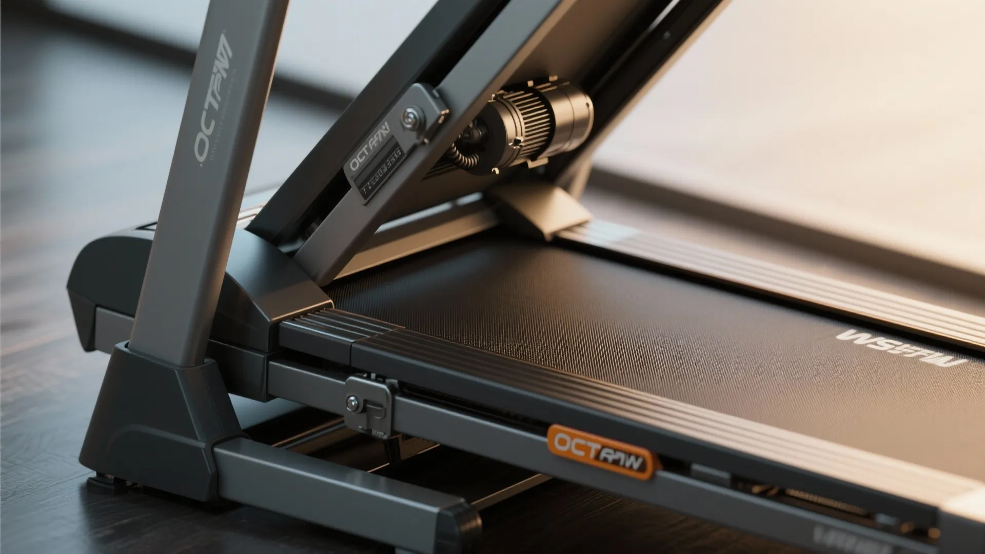 Side view of a black treadmill showing the belt frame and metal parts on floor