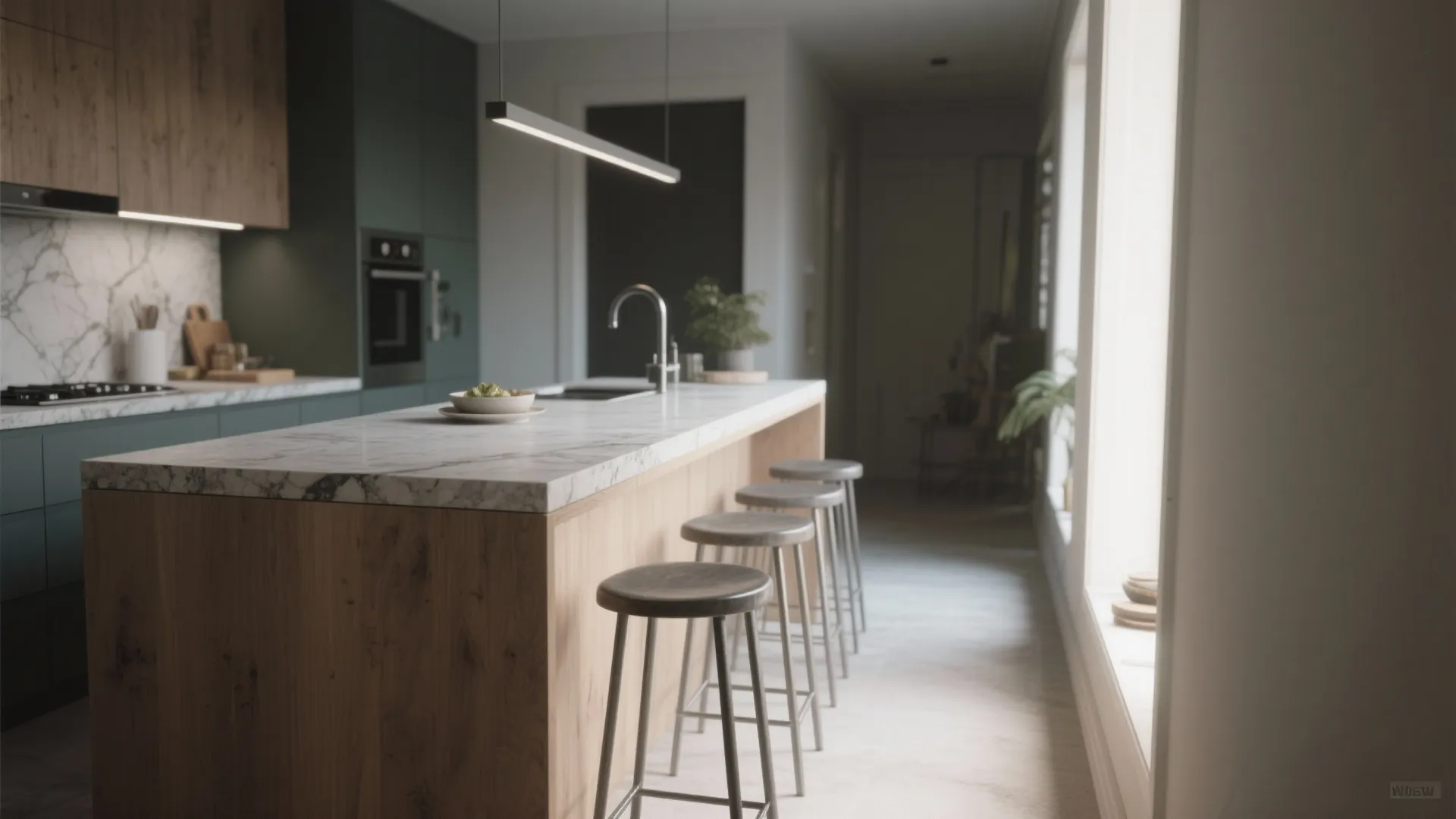 Slim kitchen island doubling as prep surface, dining counter, and desk with stools tucked underneath.