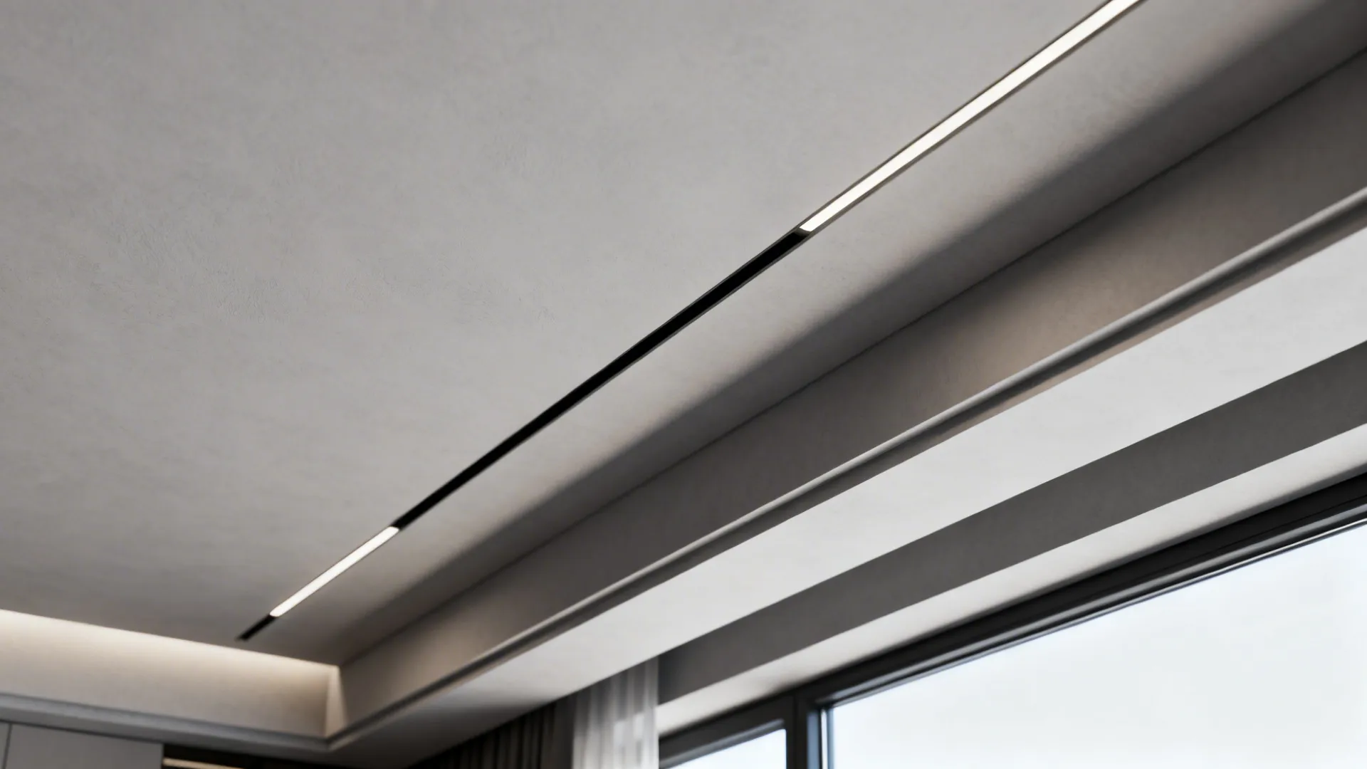 Modern white ceiling with thin black linear light tracks installed near a large window area