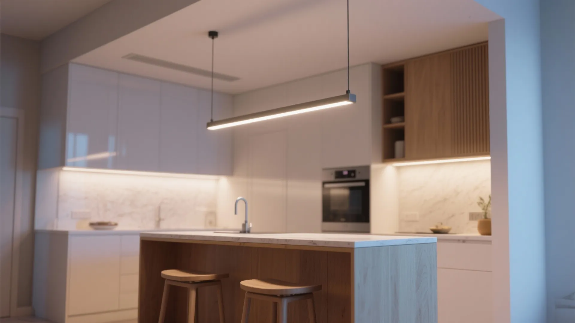 Modern kitchen with white cabinets a wood island two stools and a long ceiling light