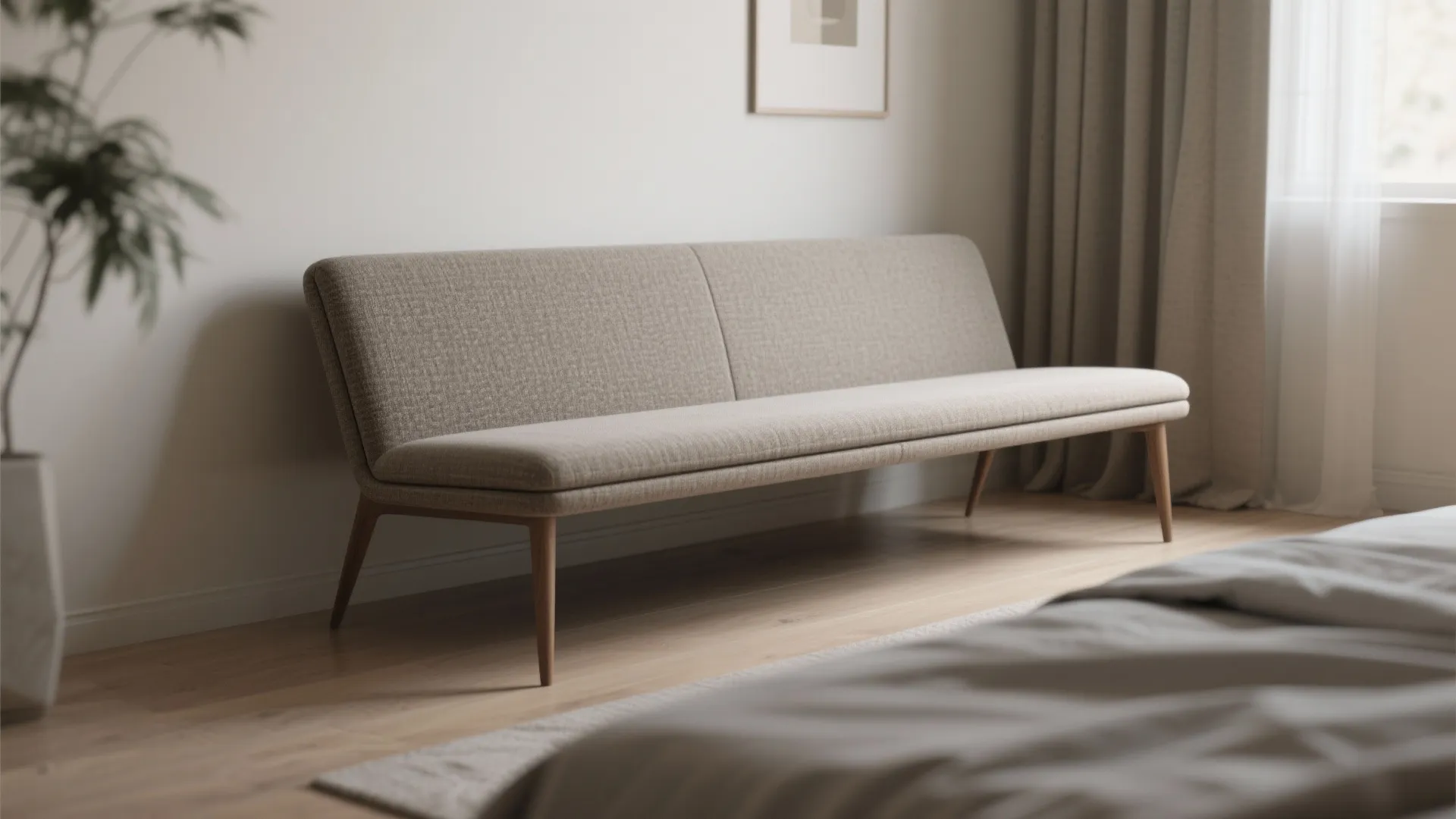 Armless slim-profile lounge chair with tapered legs in a small bedroom corner