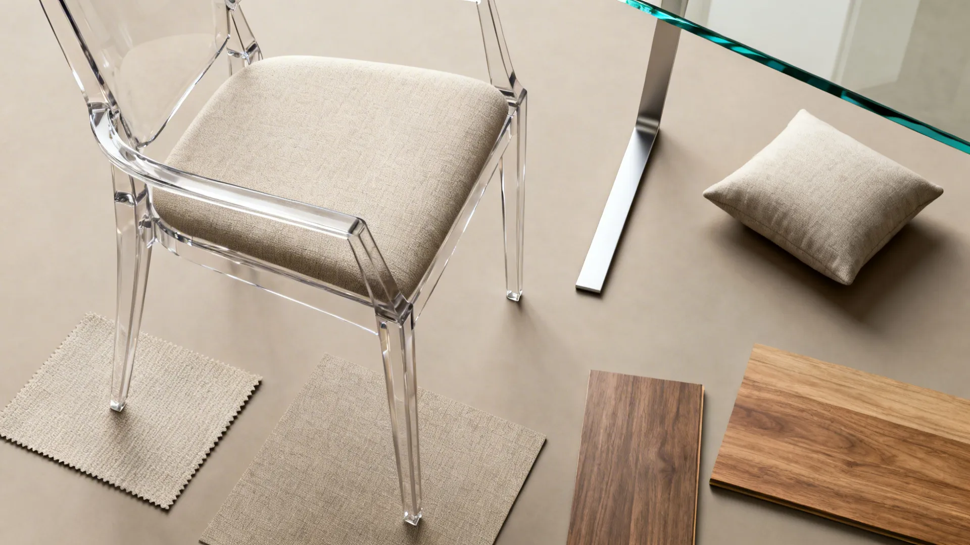 Clear chair with beige cushion next to fabric samples and wood floor boards on surface