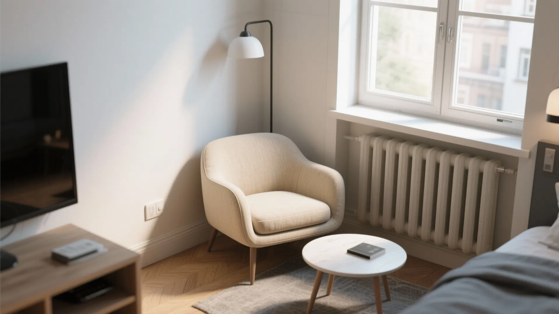 Low-profile slipper chair in a bright studio corner