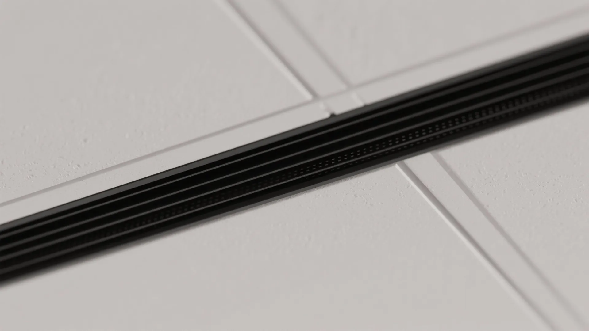 Ventilation baffle slots integrated into the ceiling