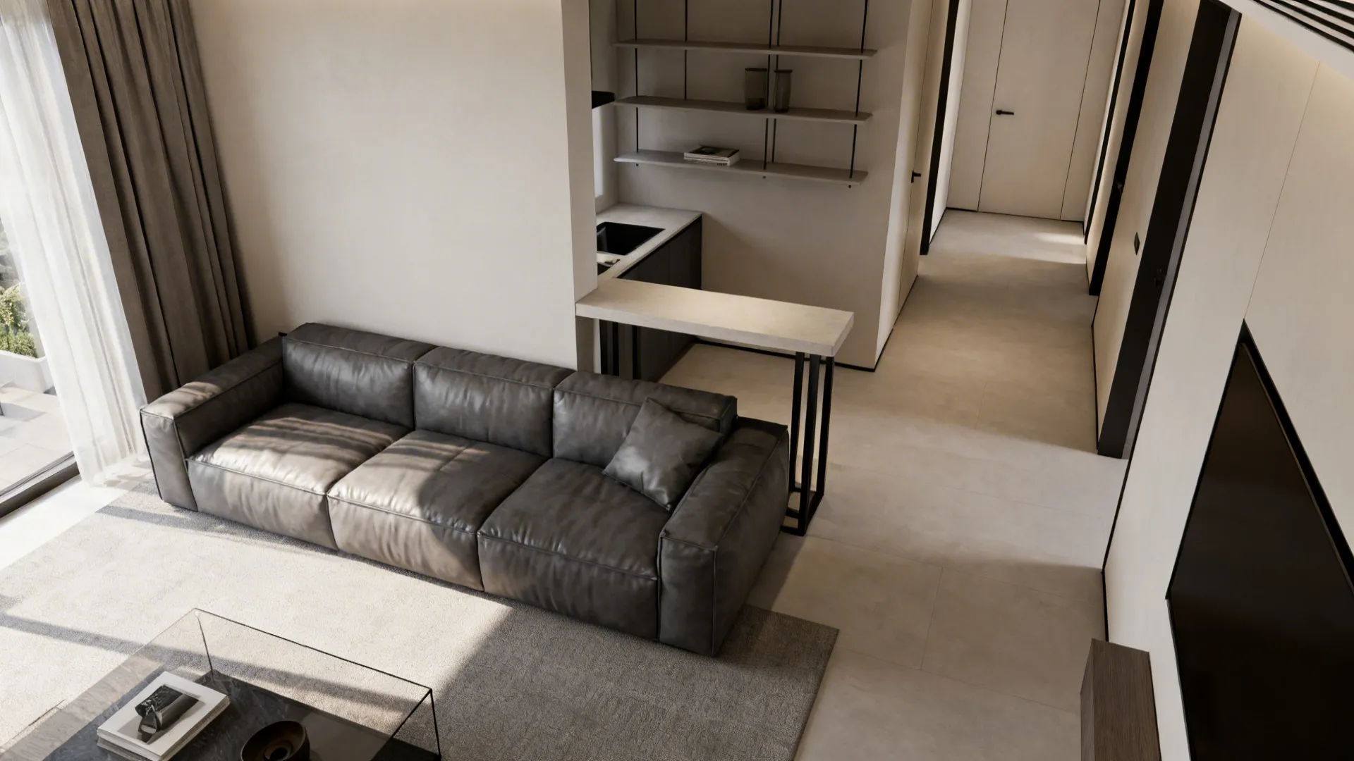 Top-down view of a small living room layout with a grey leather couch and open-legged console.
