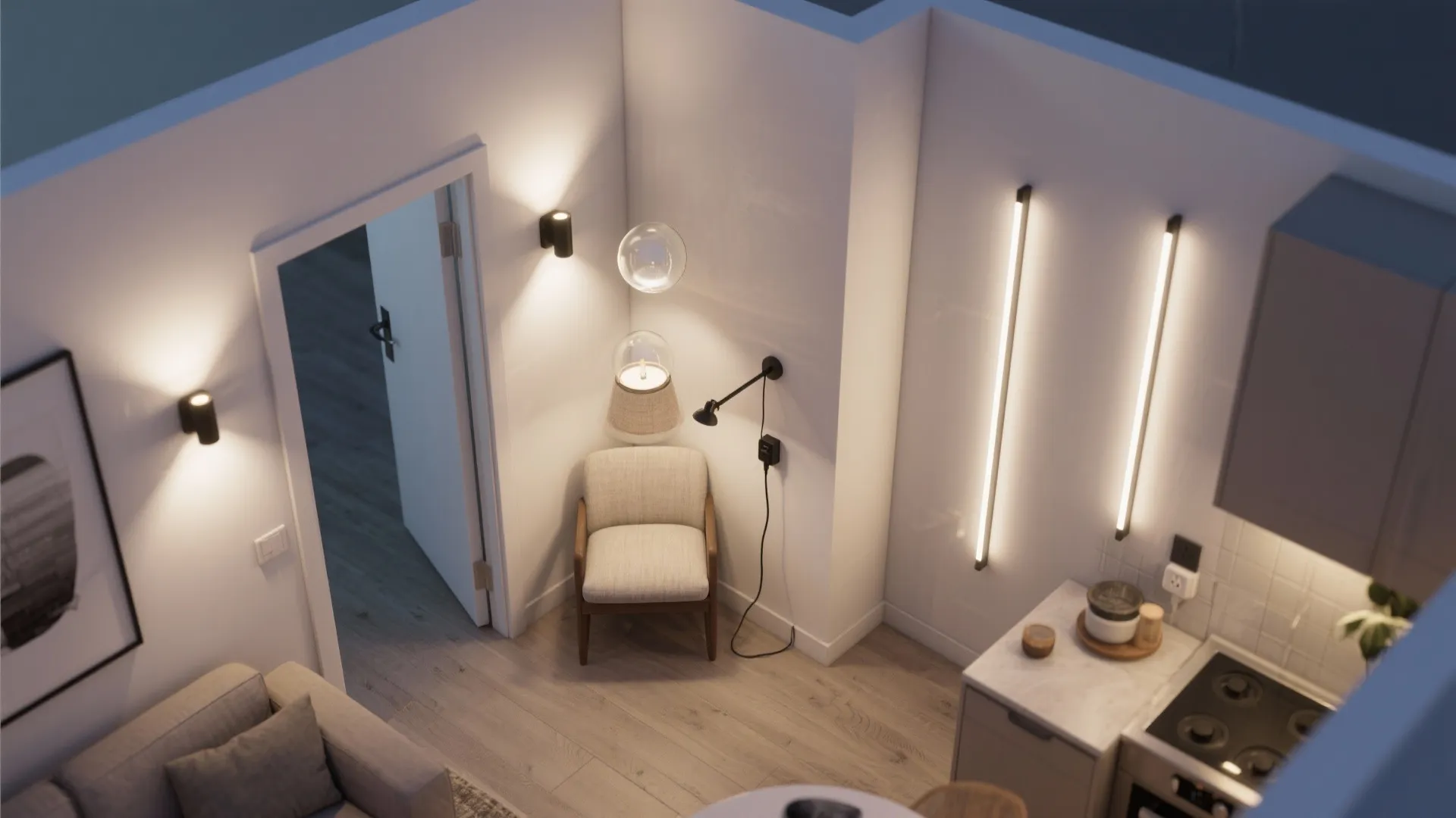 Top-down compact apartment plan showing layered wall lighting across entry, studio, dining nook, and galley kitchen.