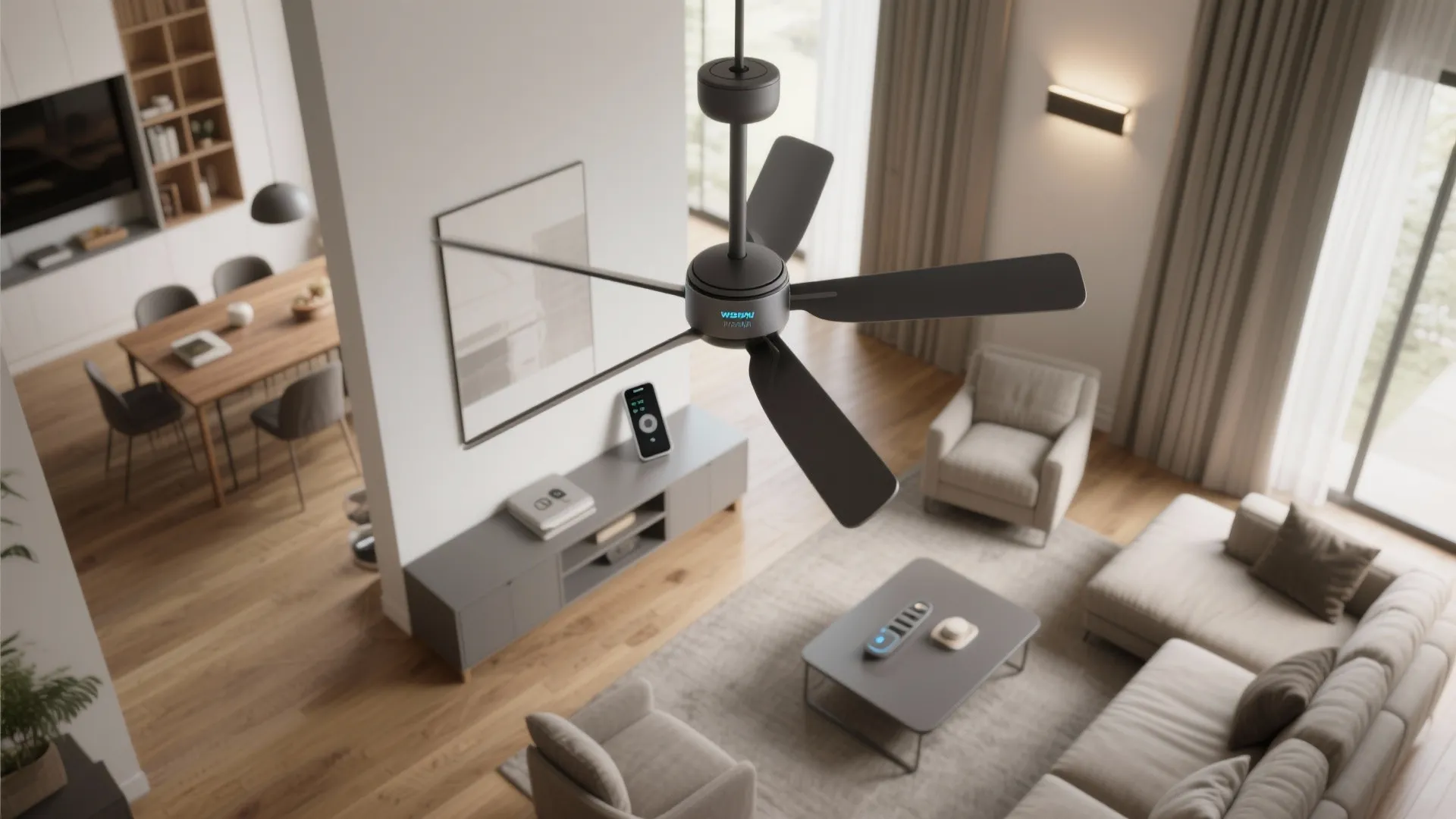 Top-down view of an open-plan living room with a smart DC ceiling fan, phone and wall control, illustrating quiet, efficient airflow.