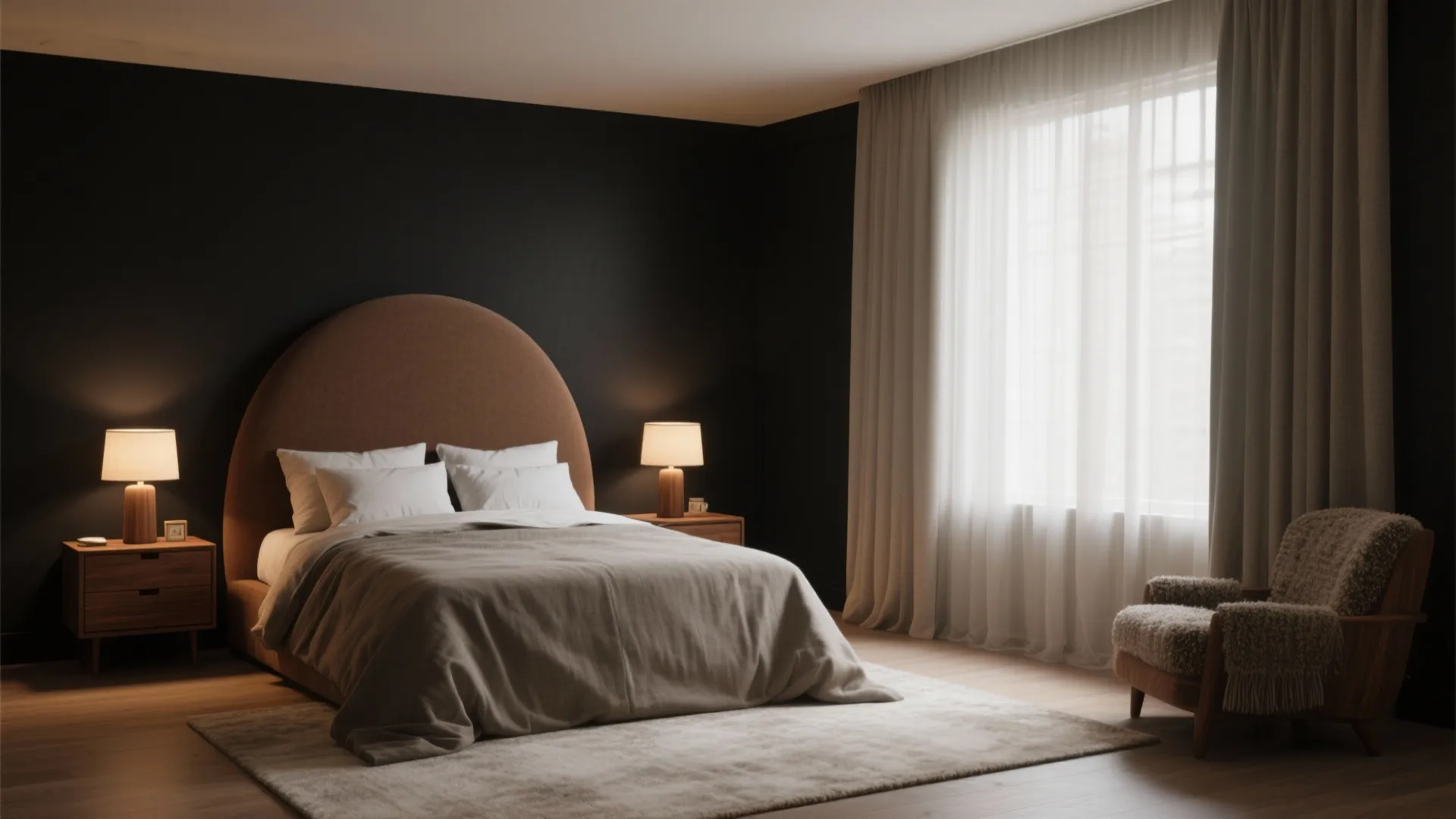 Modern bedroom featuring black walls brown bed headboard bedside tables lamps curtains and soft chair