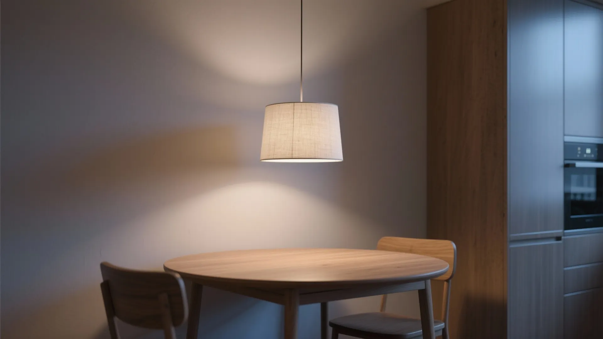 Soft-diffused pendants over a compact table