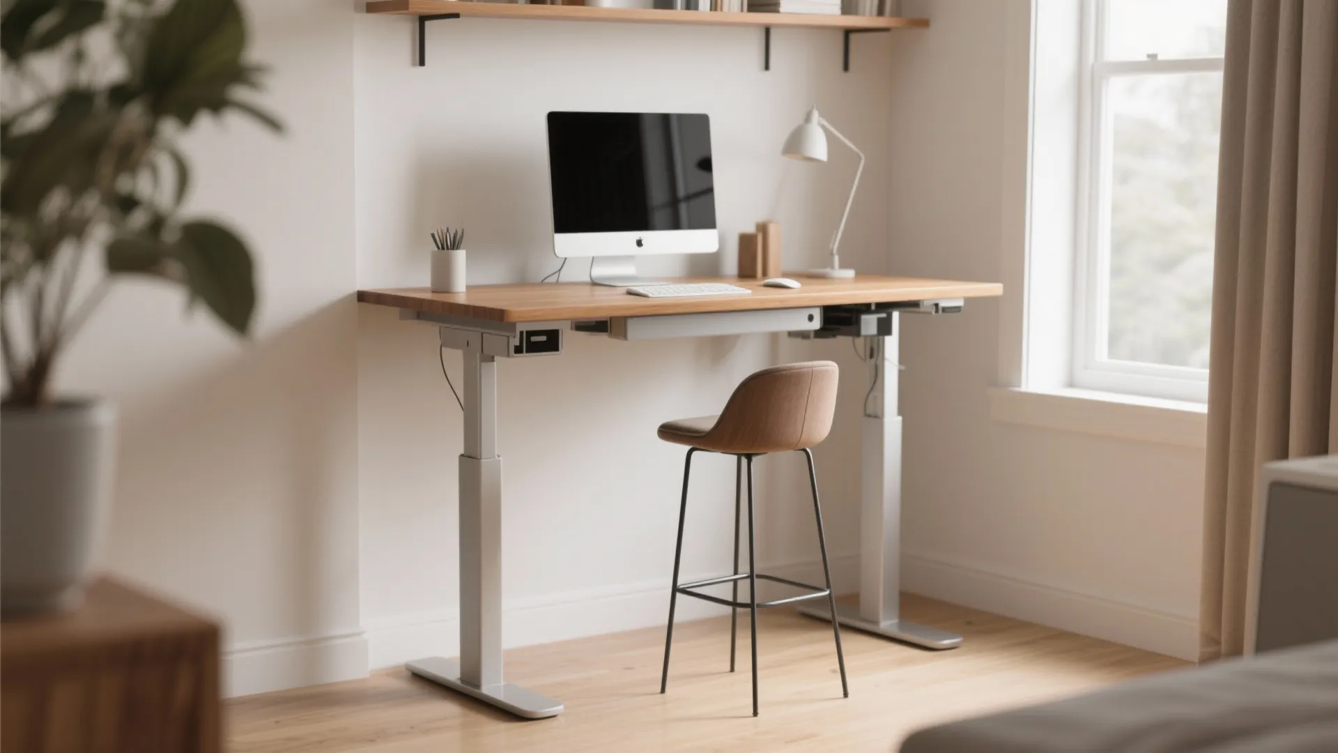 Modern height adjustable standing desk with computer monitor white lamp brown chair and wooden shelves