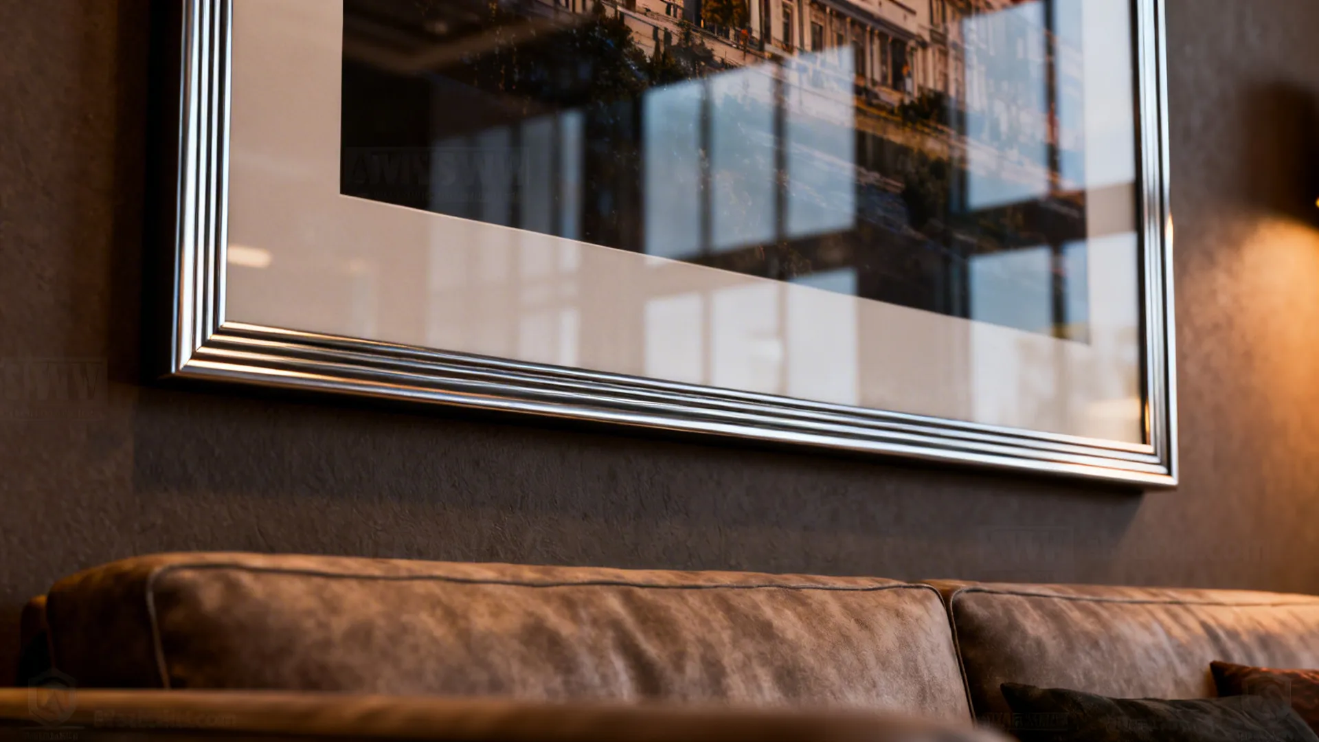 Close-up of an oversized framed photographic print with thin aluminum frame and glass reflections.