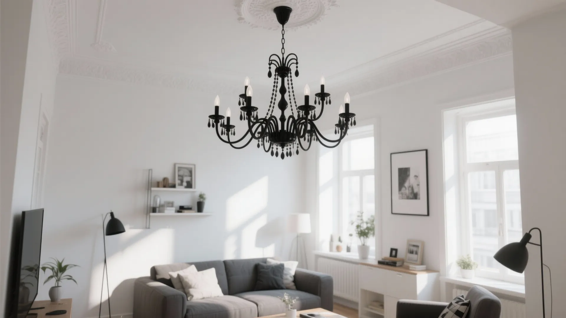 White living room with a bold black chandelier centerpiece