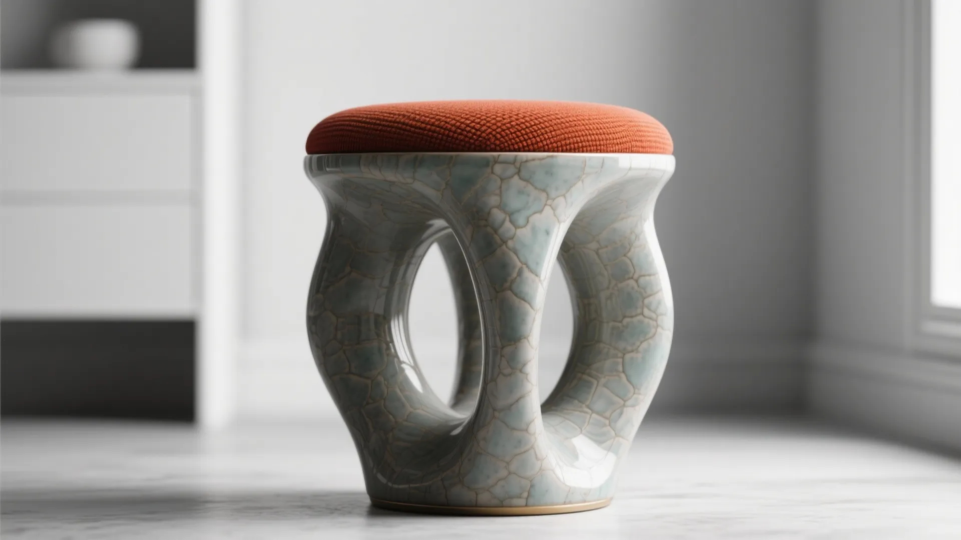 Unique marble pattern seat with orange cushion top placed in a bright modern living room space