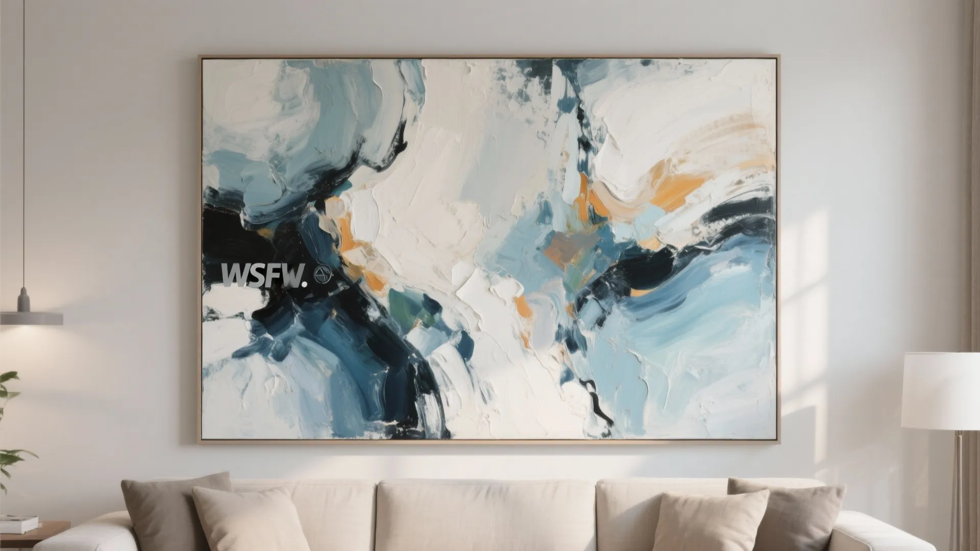 Large abstract wall art as a focal point in a living room