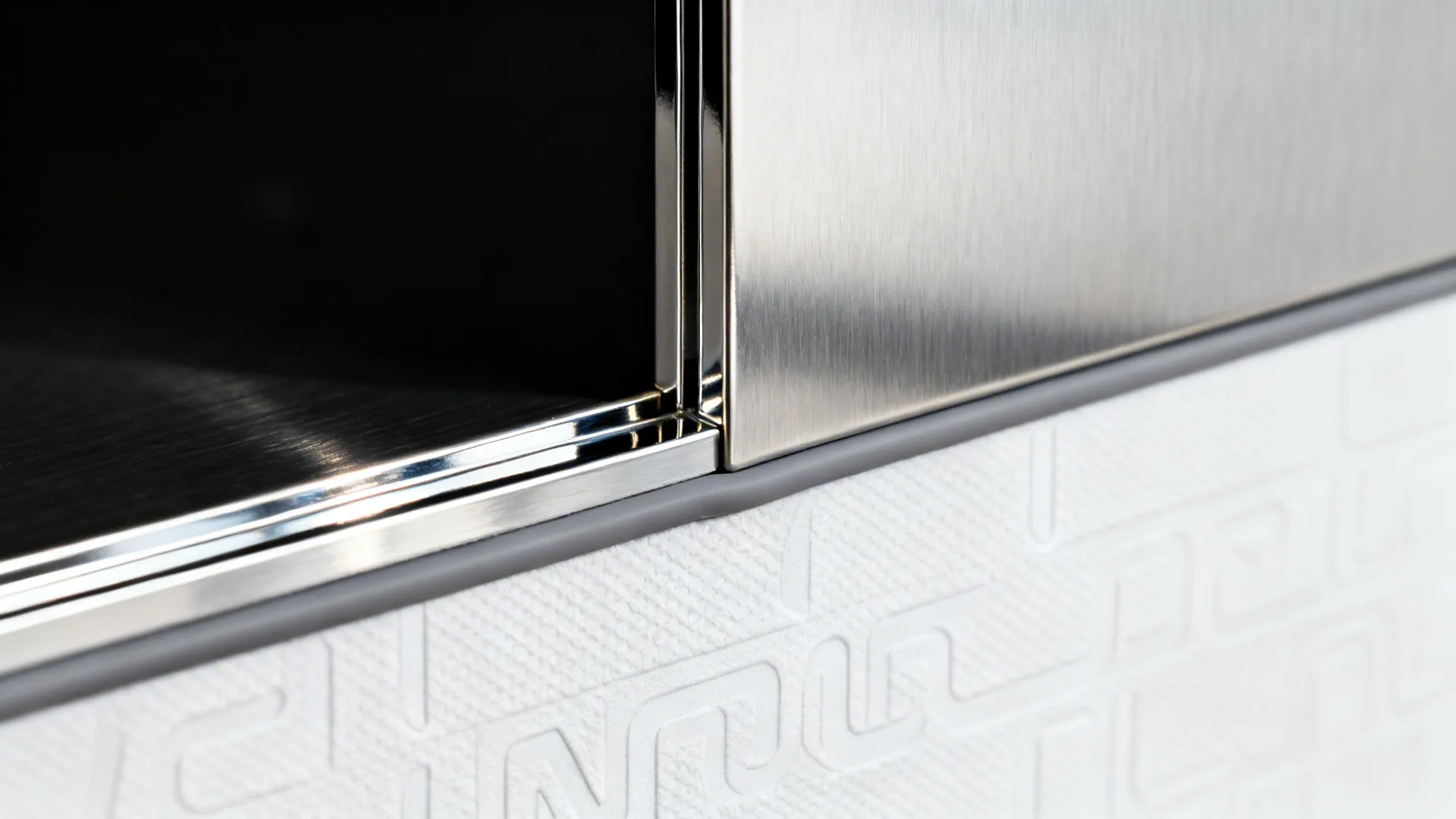 Heat-aware zones: combining vinyl and metal near the cooktop