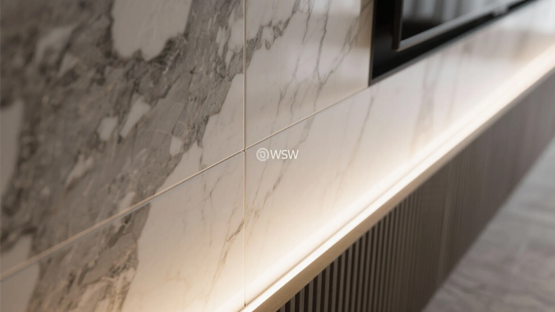 Stone-clad media wall with integrated LED coves