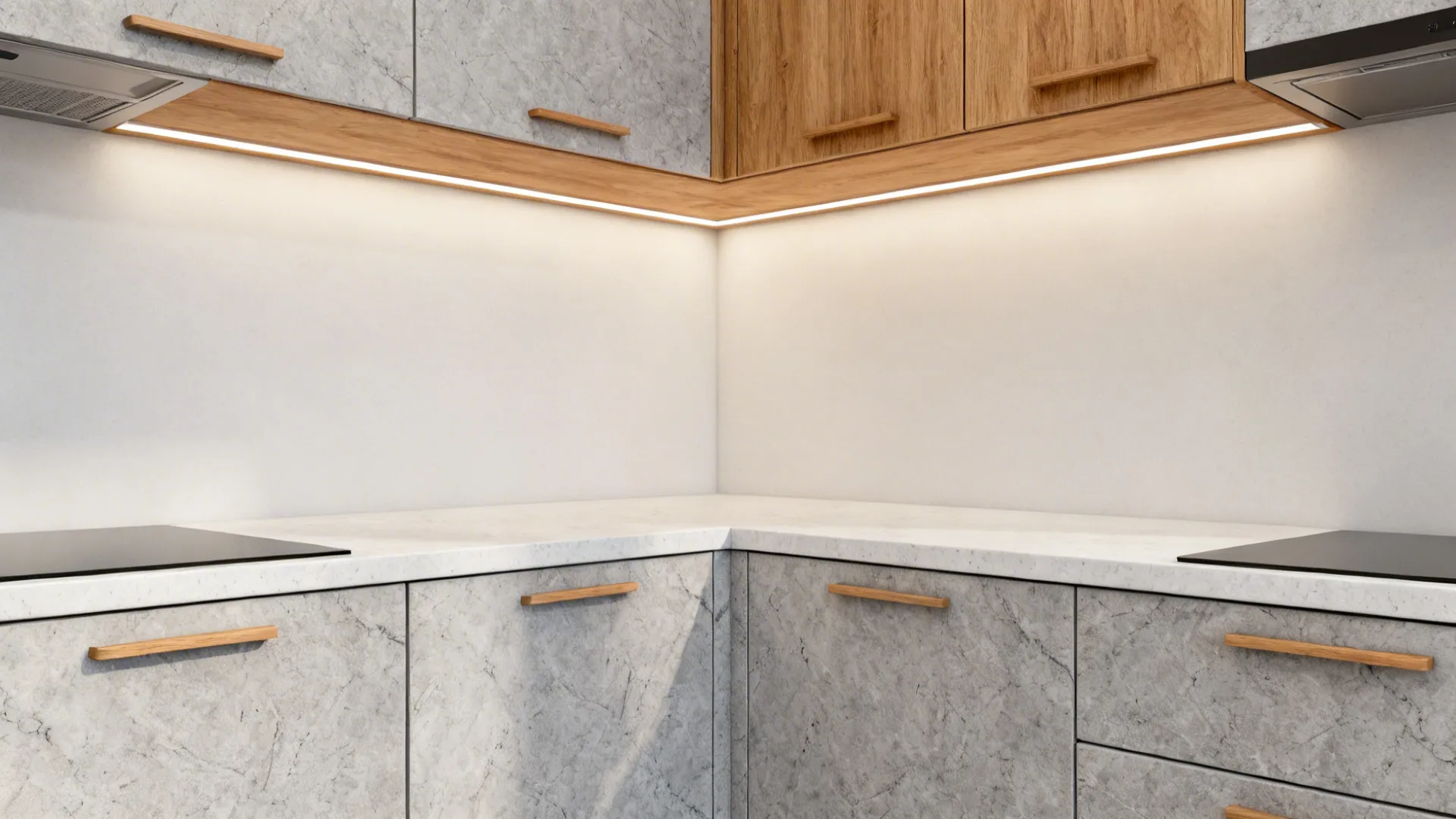 Stone-look laminate cabinet fronts with slim oak pulls and a honed quartz countertop in a small kitchen.
