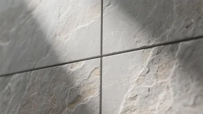 Textured Gray Tile Wall Design – Modern & Natural Aesthetic