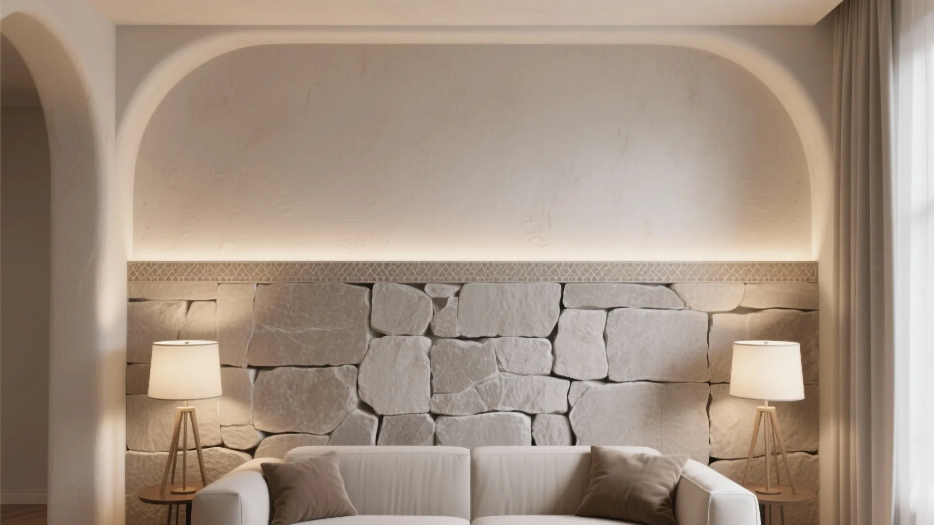 Modern living room featuring a stone wall panel white sofa two lamps and soft lighting