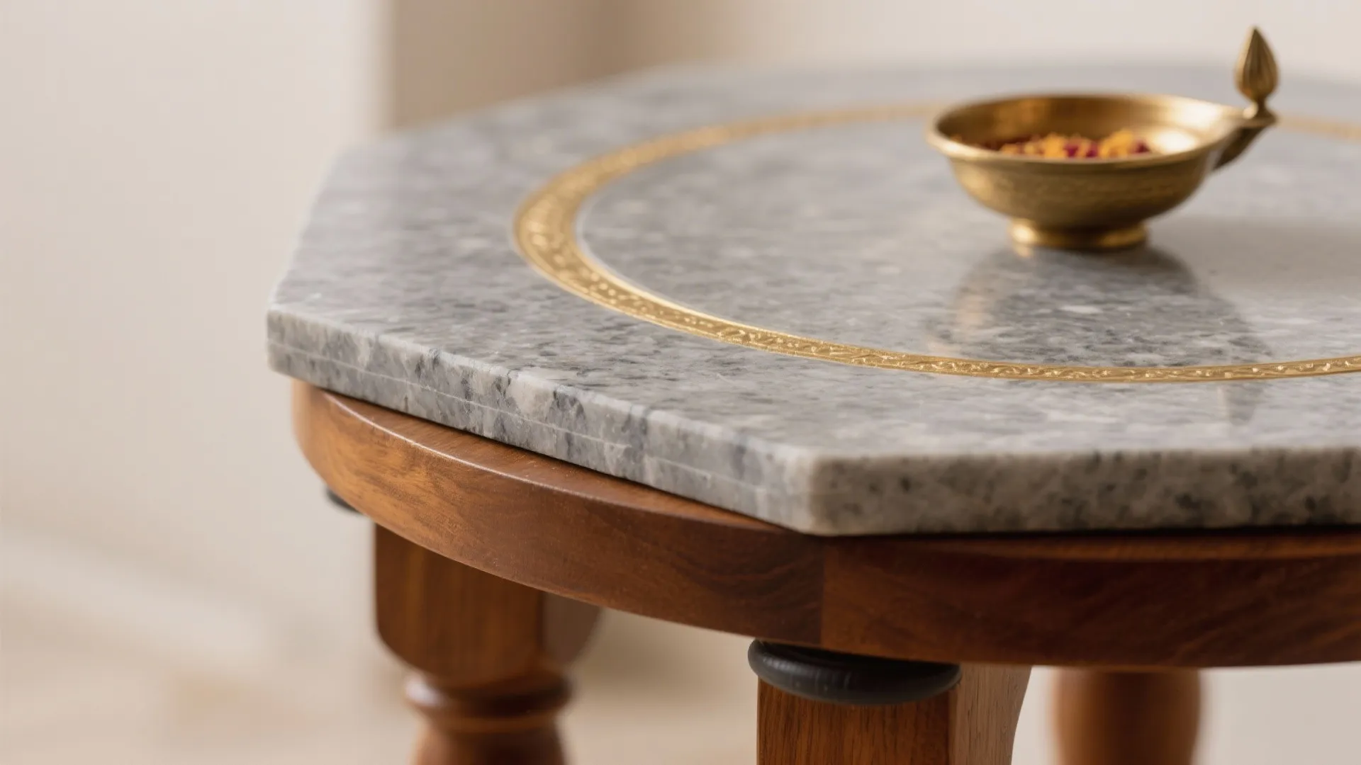 Stone-and-wood pedestal with brass accents