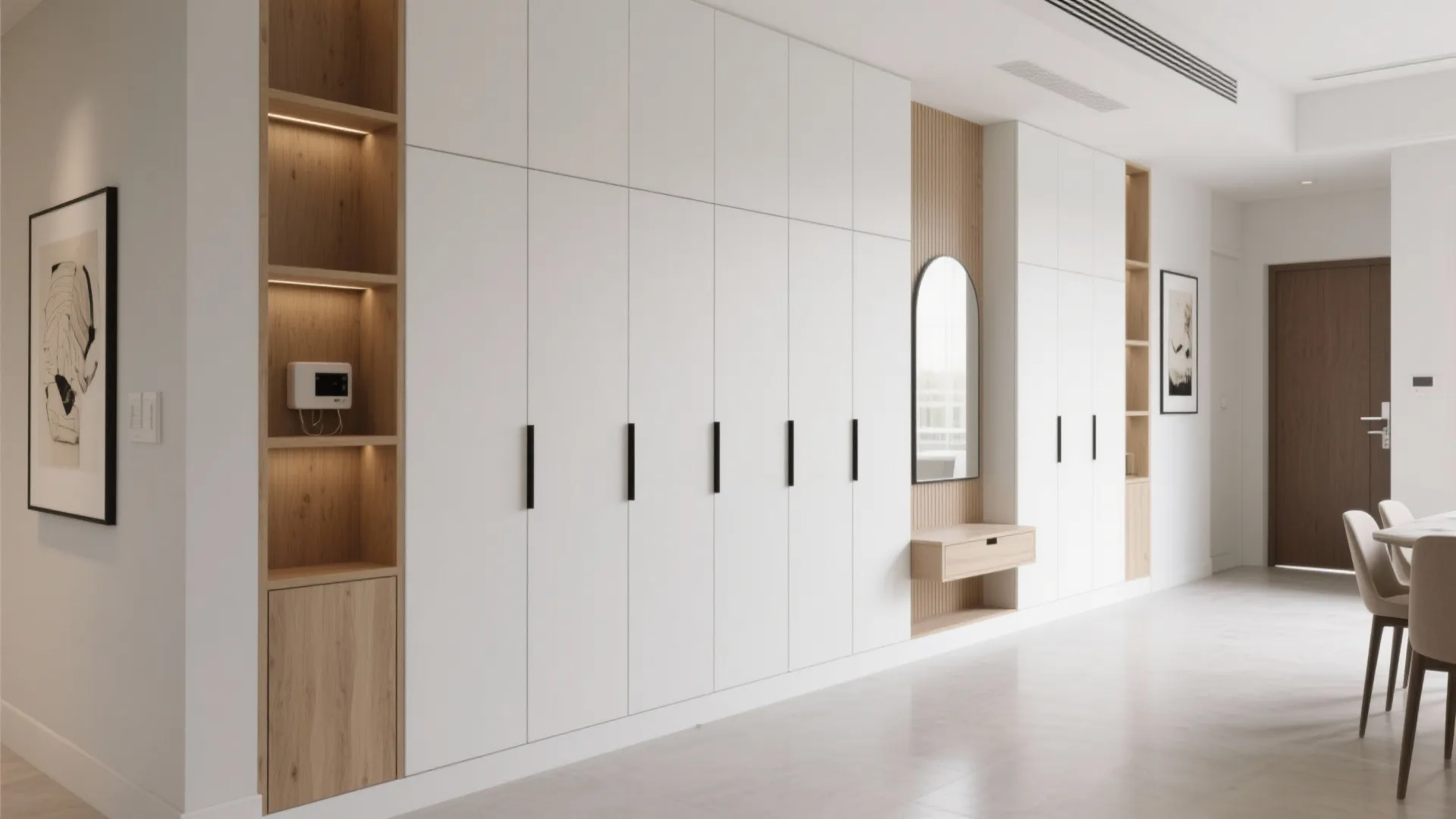 A full-height storage wall that hides the mess