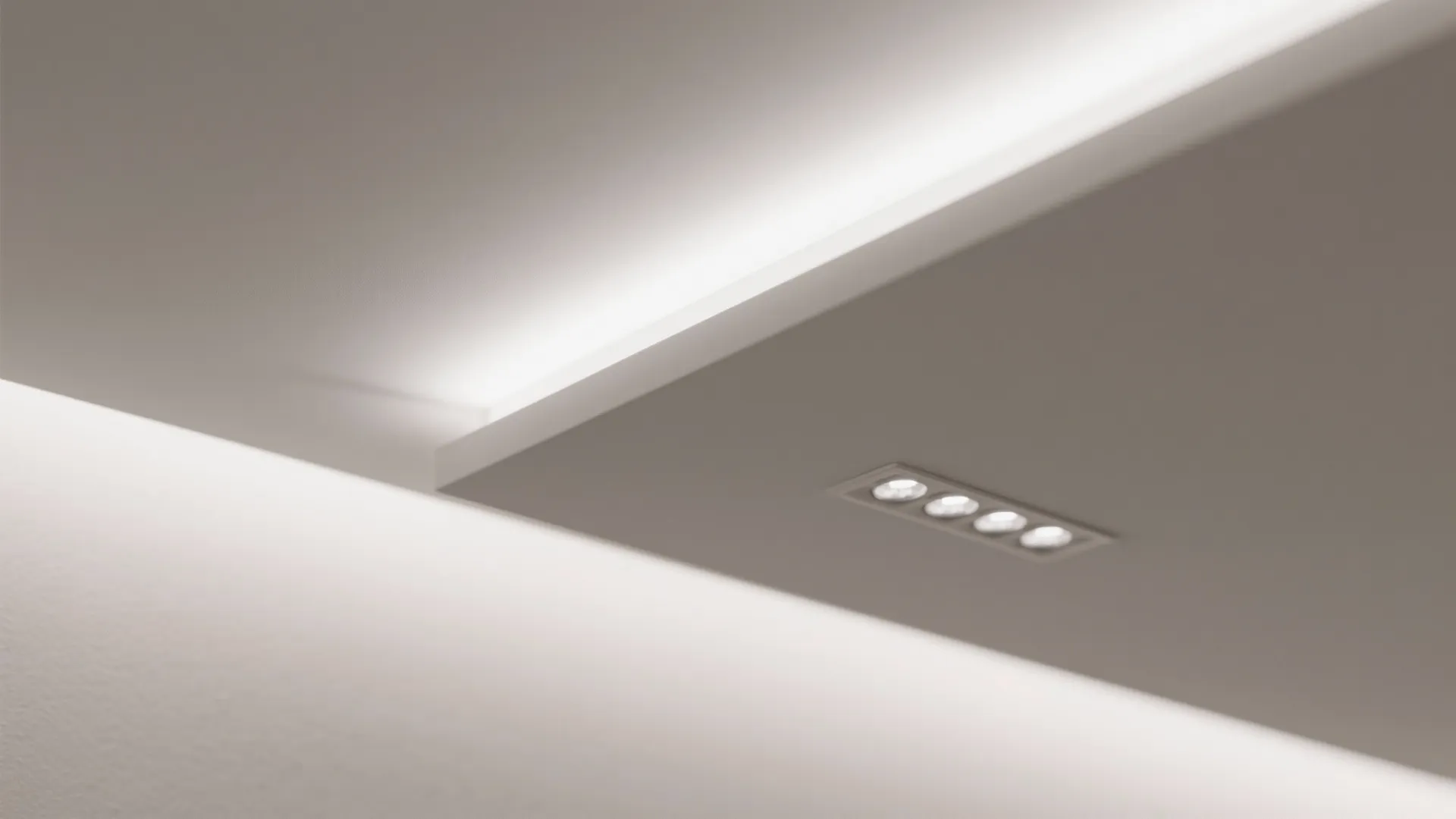 Monolithic white stretch ceiling for a sleek, bright corridor