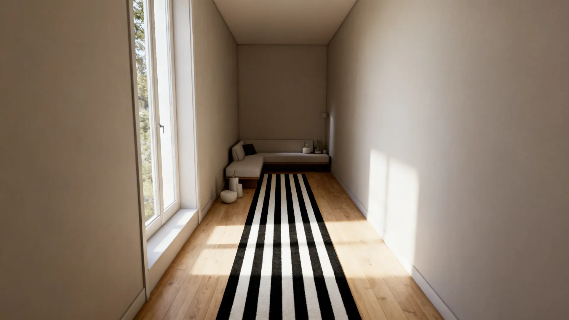 Elongated living area with a minimalist black-and-white striped rug visually widening the space.