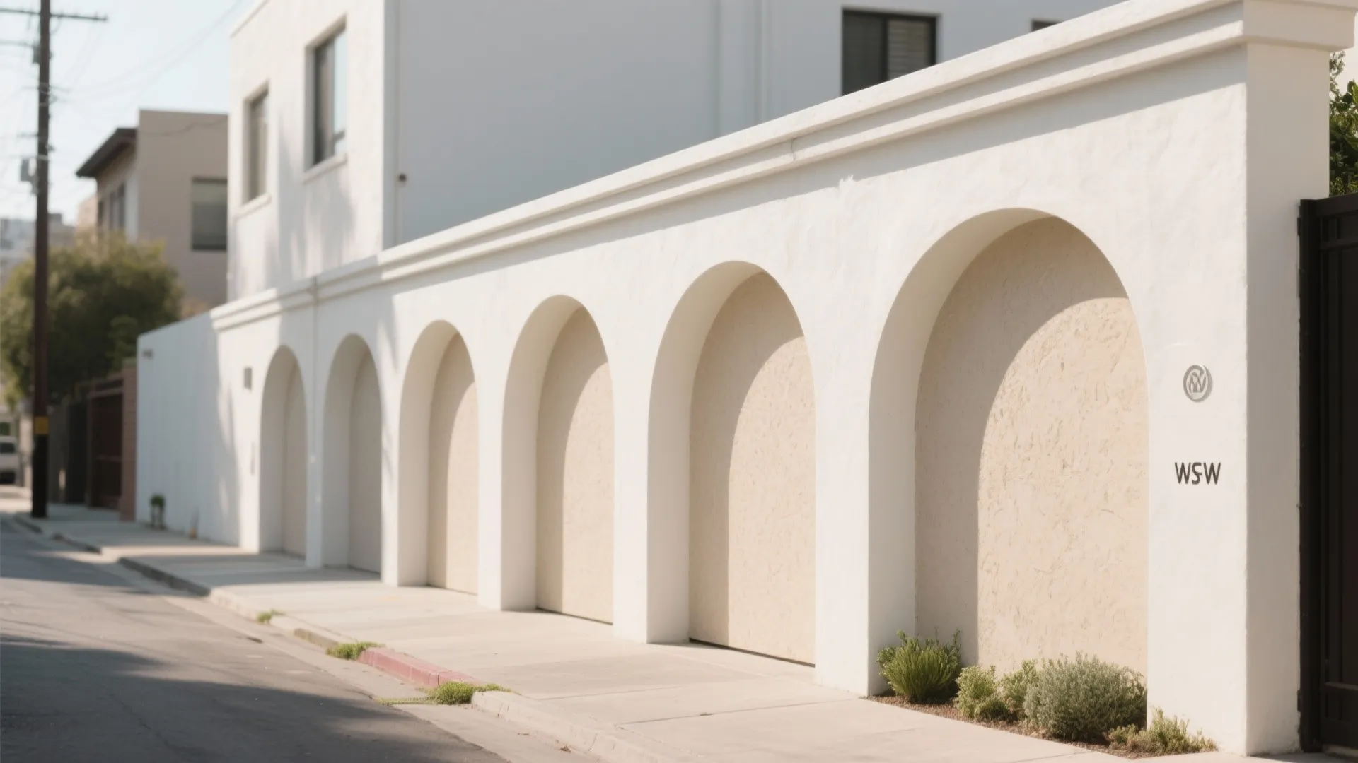 Minimalist Stucco Arches on a Modern Compound Wall