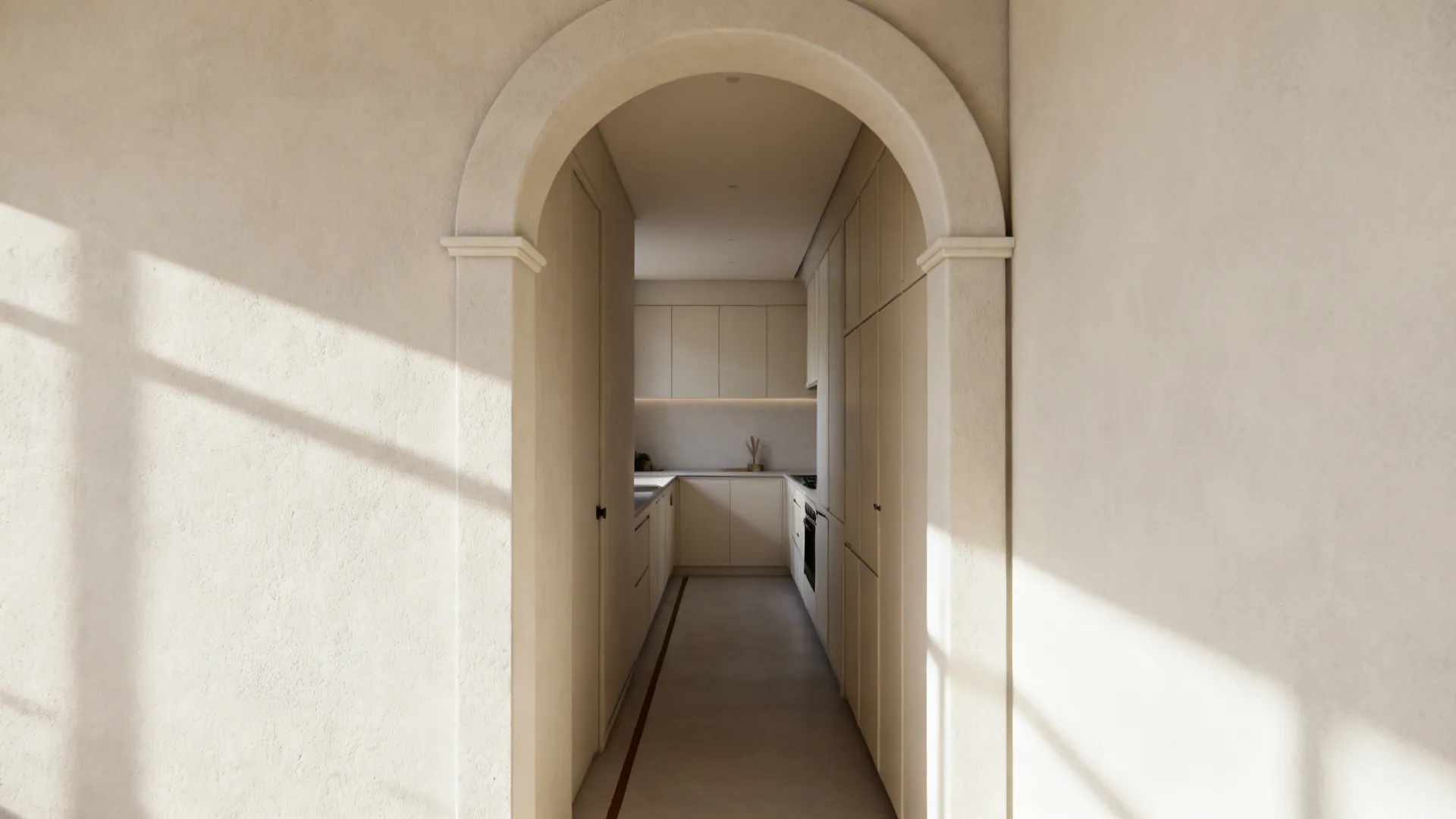 Stucco half-arch to soften a galley entry