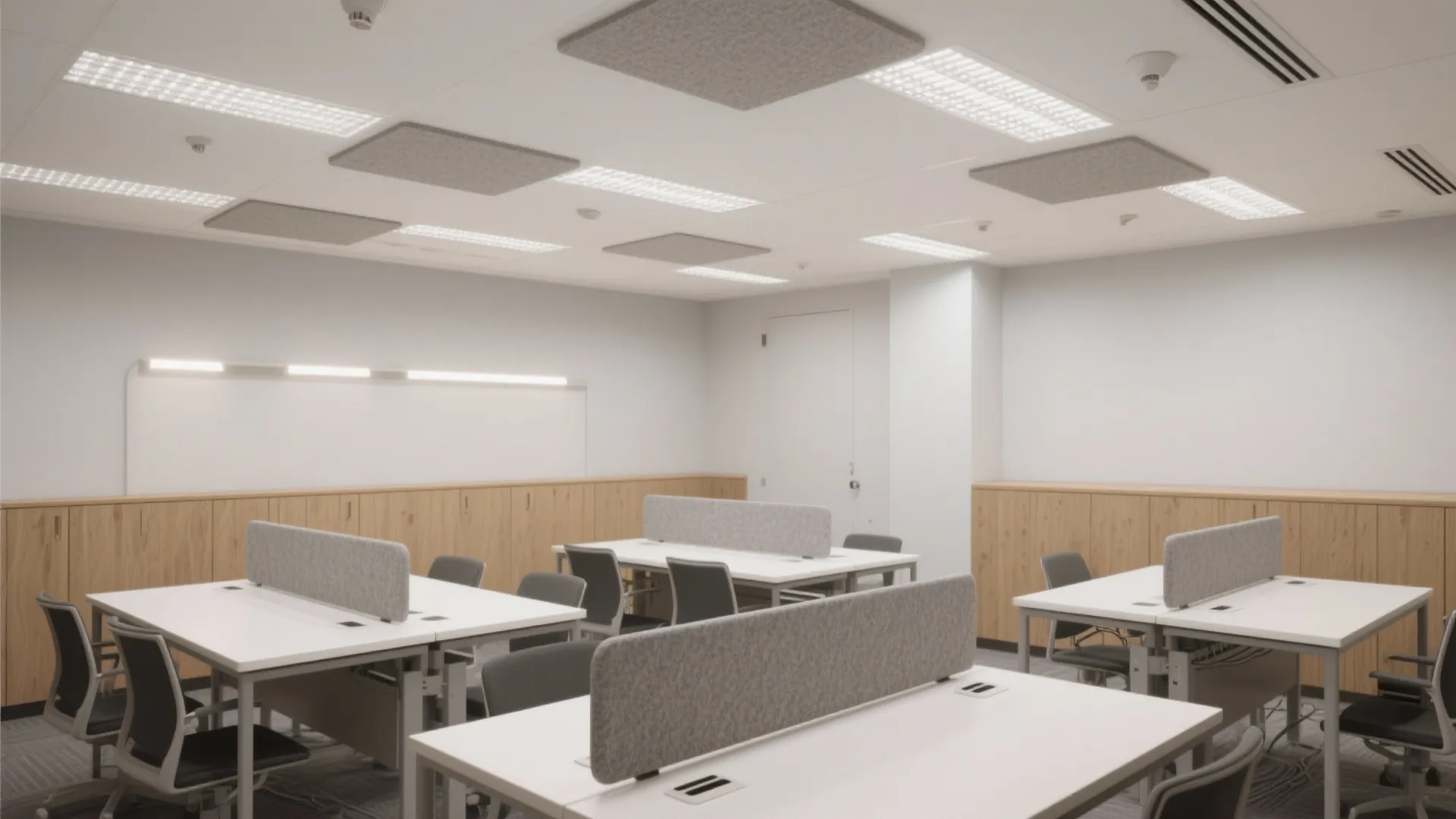 Modern office interior with white desks grey chairs wooden cabinets and square acoustic ceiling panels