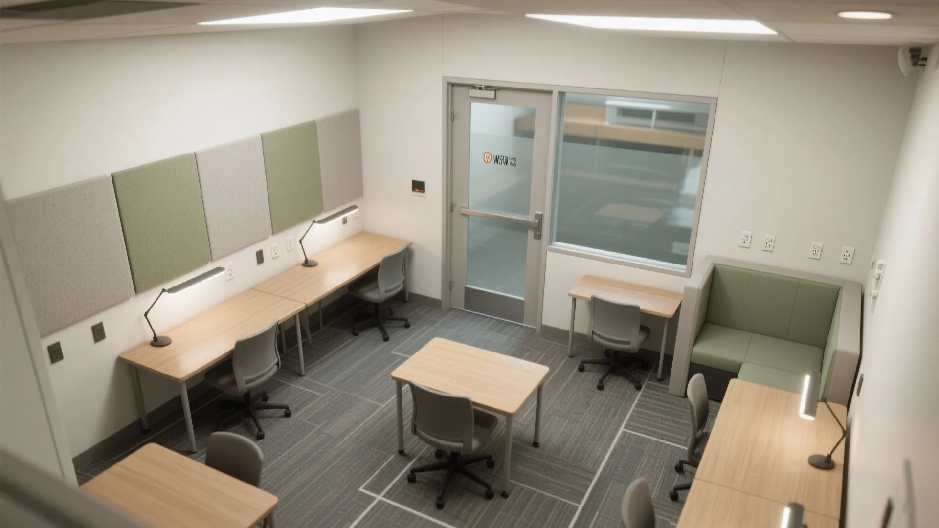 Modern office study room with wooden desks grey chairs green wall panels and a glass door