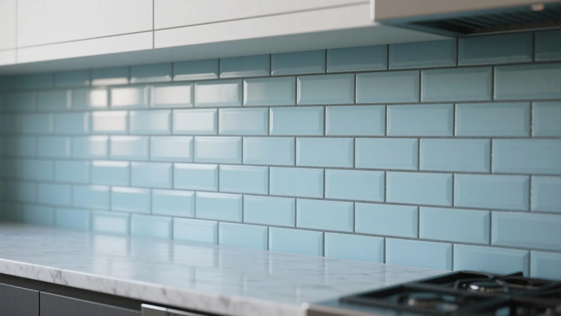 Close-up of cerulean subway tiles with darker grout and quartz countertop edge.